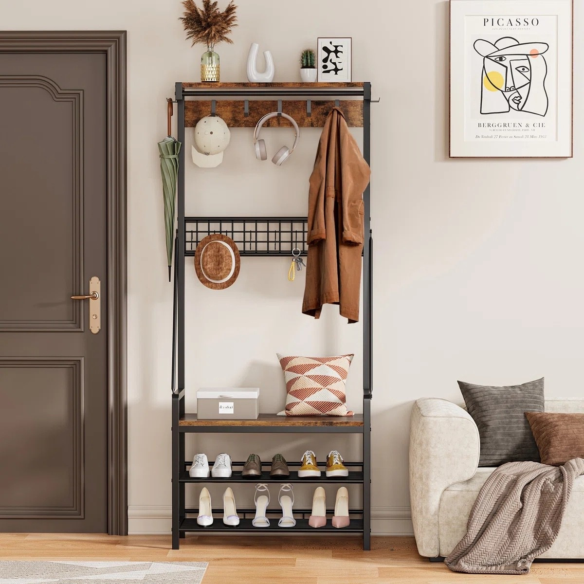 This hall tree is such a functional and stylish solution for any entryway. The wood and black metal combo gives it that modern industrial feel, while the hooks, bench, and shoe storage keep everything organized in one spot. Perfect for small spaces and currently on sale at Wayfair, making it an easy upgrade for a clutter-free entry.

#LTKSaleAlert #LTKHome