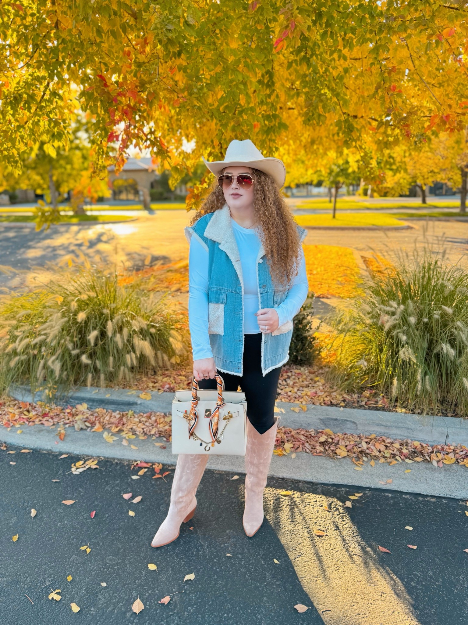 Fall layering, western style 🍂🤠 This faux shearling lined denim vest is my go to for cozy cool vibes. Everything linked for your own autumn cowgirl look ✨ western fall outfit | western fall look | boho cowgirl | Nashville outfit | Nashville bachelorette look | country concert outfit | western concert outfit | concert season | cowgirl boots | amazon cowgirl boots | beige cowgirl boots | amazon beige cowgirl boots | amazon boots | amazon finds | amazon fashion | amazon outfit | amazon look | amazon concert outfit | amazon concert finds | western concert outfit | western fashion | amazon western fashion | amazon western outfit | vest | amazon vest | amazon denim vest | oversized denim vest | leggings | amazon leggings | black leggings | leggings outfit | western leggings outfit | white long sleeve top | Amazon white fitted top | amazon cowgirl hat | cowgirl hat | amazon neutral cowgirl hat | fall concert | fall concert outfit | fall western outfit 

#LTKStyleTip #LTKSaleAlert #LTKMidsize