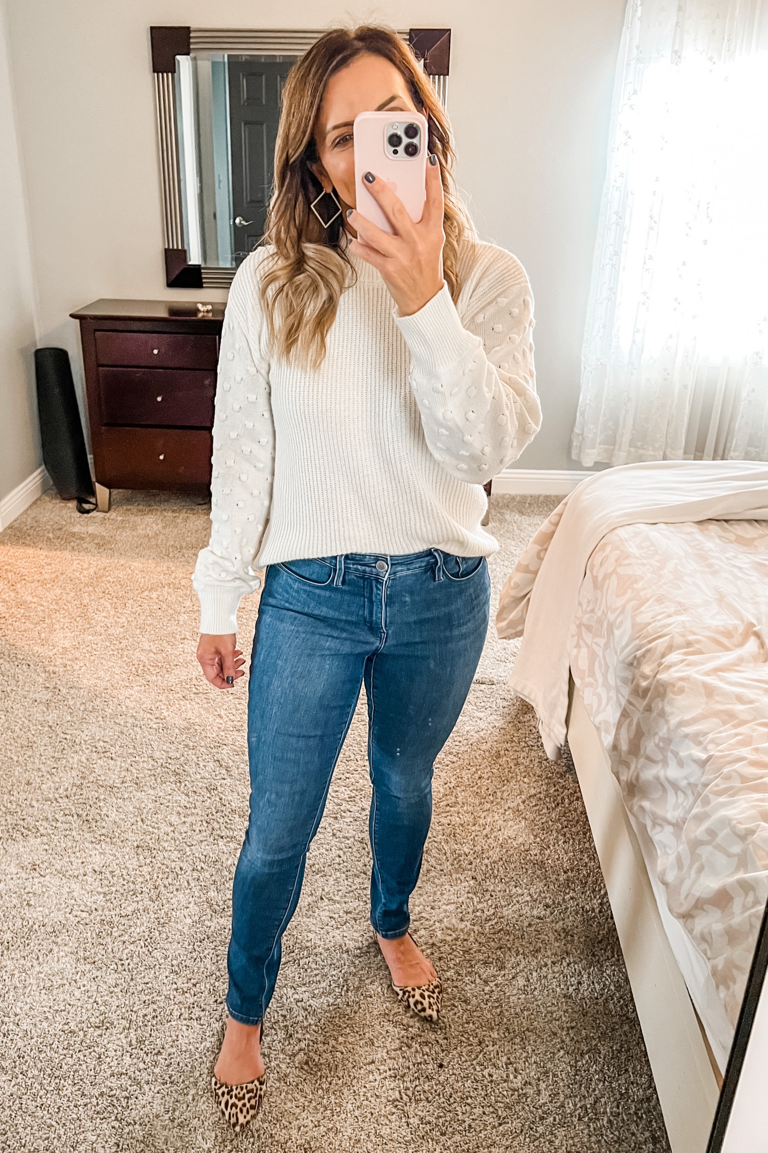 Great sweater for holiday gatherings - cute polkadot detail on the arms give it a festive feel. Dress up with a skirt or down with jeans. 

#LTKunder100 #LTKHoliday #LTKCyberweek