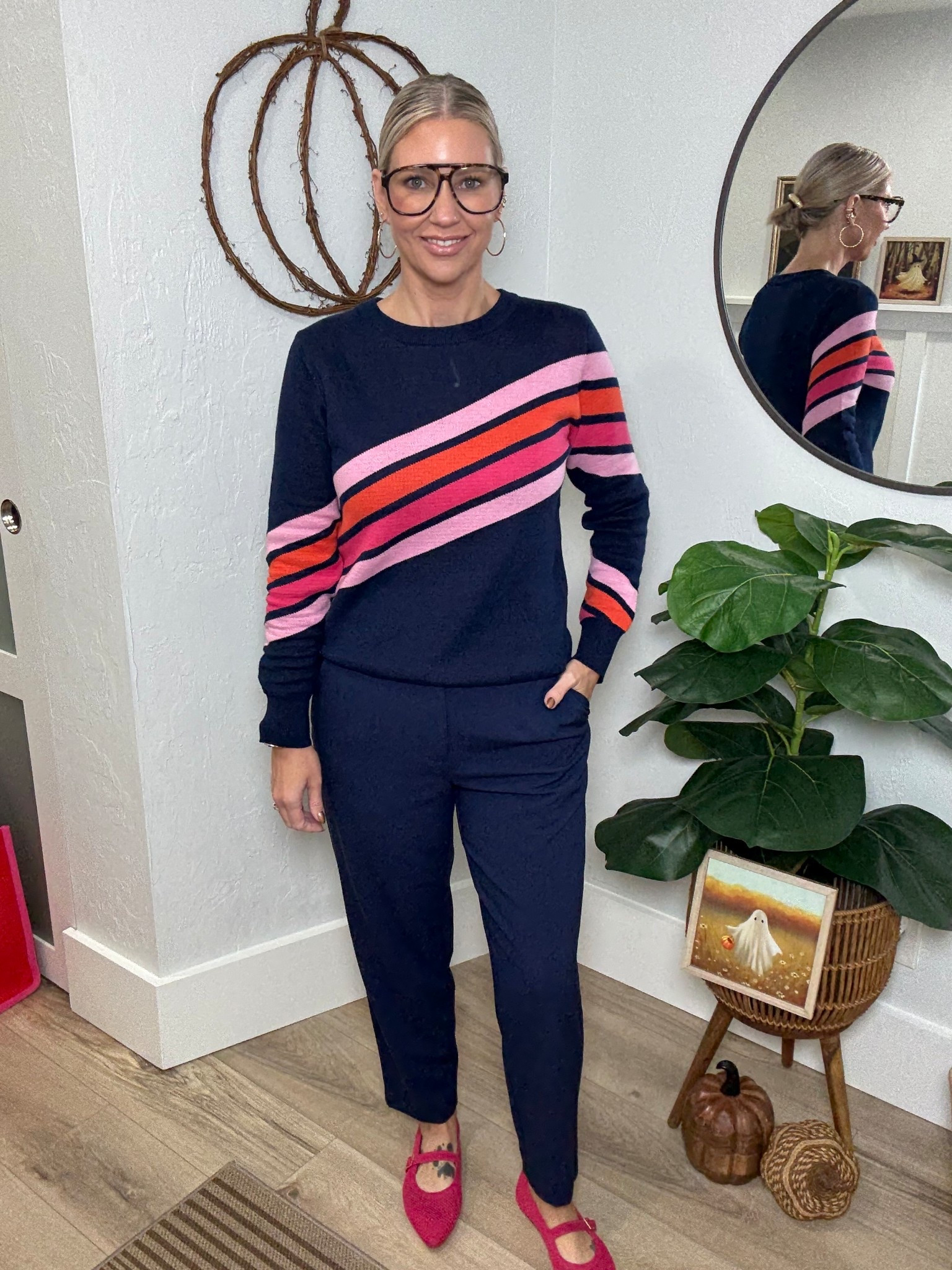 Never thought I was a retro fashion kinda gal, but I love this sweater!! 

It’s from Oxknit a company that specializing in retro style fashion. The quality of this top is fabulous. It’s a thicker material, more like a lightweight sweater. I’m wearing a medium. 

My pants are the straight leg tapered trouser from Target. They have stretch at the waist band and belt loops. I’m wearing a 6. If you’re in between you could size down. 

My flats are from Amazon. 

Casual workwear, office attire, navy blue outfit, striped sweater, 

#LTKFindsUnder50 #LTKOver40 #LTKStyleTip