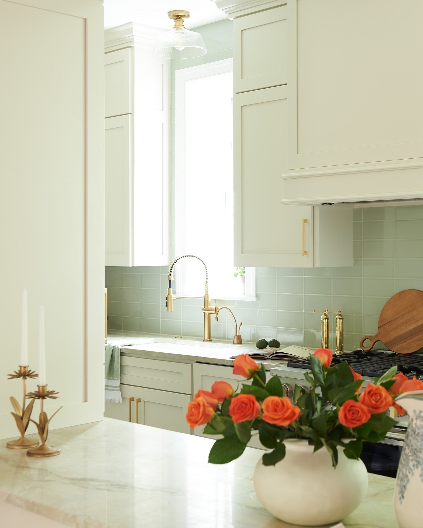 It always starts with the little moments…morning light pouring through the window, fresh blooms set just so, and a color palette that feels like home. 

This kitchen was all about layering softness and warmth. A gentle green backsplash, “Glossy Dream” marble countertops that live up to their name, and cozy cabinet hues that create the most inviting space! 

#thorntonid #customkitchens #customcabinets #kitchensofinsta #kitchensofinstagram #kitchendesignideas