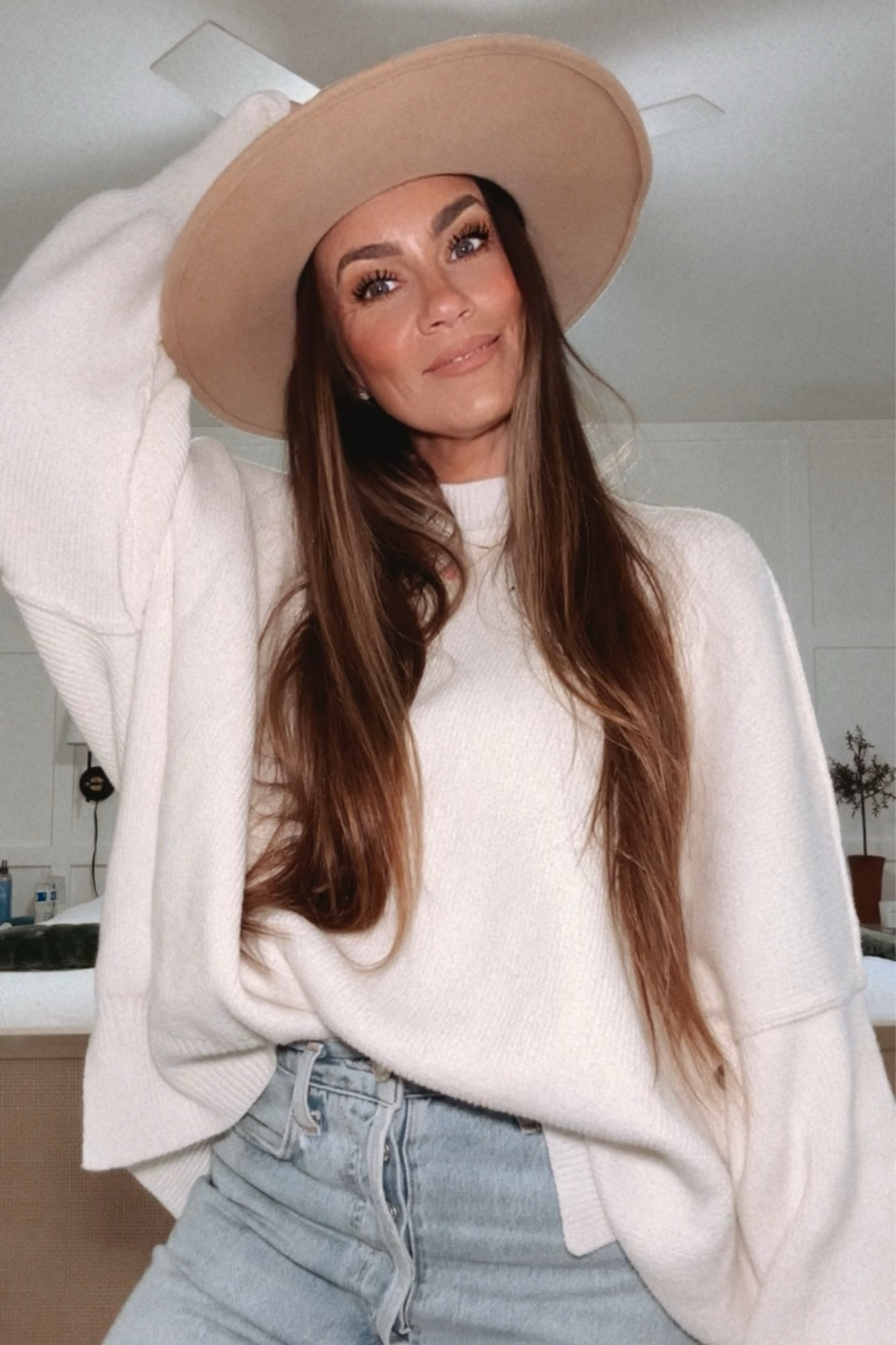 Winter outfit idea: free people easy street tunic with dad jeans. Wearing XS/S top  

#LTKworkwear #LTKSeasonal #LTKfindsunder100