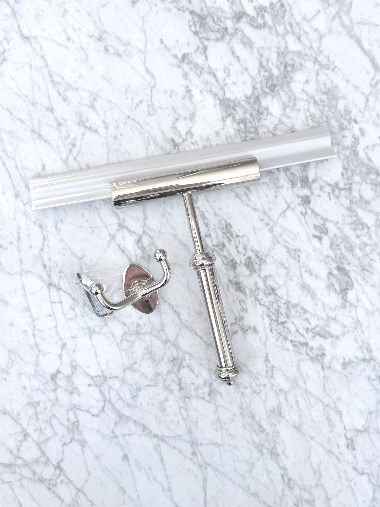 The prettiest shower squeegee you’ve ever seen in polished nickel with mounting hardware 

#LTKHome