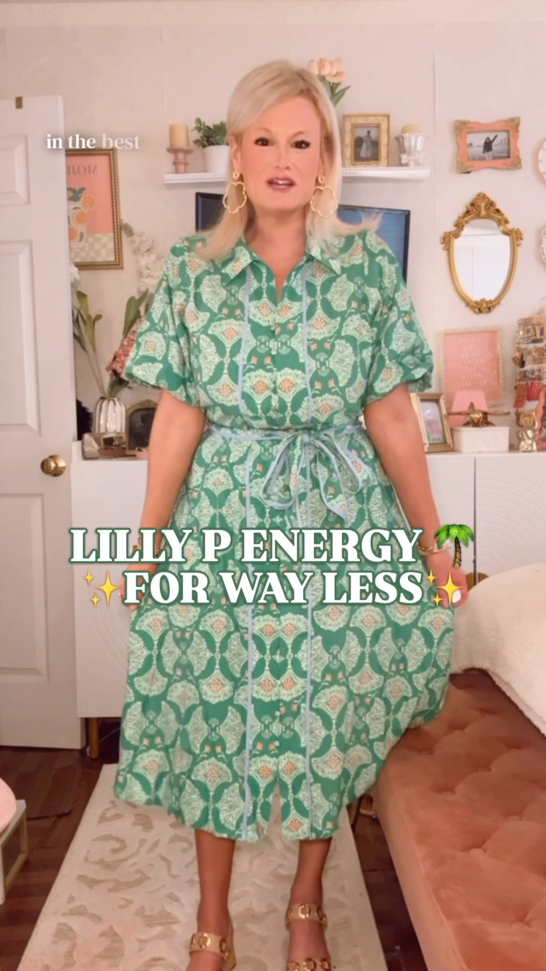 Lilly Pulitzer look for less | summer dress | wedding guest dress | vacation dress | Palm Beach style

This dress is pure Lilly P energy for way less, and the fan botanical print is what makes it feel so undeniably Palm Beach.

The pink and green fan botanical print, light blue color pop, wrapped buttons, sleeveless silhouette, polished midi length, and 100% cotton fabric give it that Palm Beach heiress summer dress look without the Lilly Pulitzer price tag. The colors are vibrant, punchy, and made for summer plans. It is so fabulous. 

I’m in a petite large. I sized up for more room in the bust. I’d say it runs true to size, but if you need extra room through the chest, I would go up one size.

The petite sizes are around $34 right now, and the regular sizes are part of a buy 1, get 2 free promo. There are two other prints available too, so this is a very smart time to grab the print you want and build the cart around the promo.

This is the dress you buy for vacation dinners, summer brunch, wedding guest outfits, bridal showers, baby showers, church, resort lunches, beach town shopping, family photos, date night outfits, garden parties, and every warm-weather plan where you want the dress to look expensive without spending like it.

Style it with gold sandals, raffia slides, pearl earrings, a woven clutch, white sandals, wedges, or a straw tote.

Lilly Pulitzer look for less, Lilly P inspired dress, Palm Beach style dress, pink and green dress, summer dress women, summer outfit, wedding guest dress, summer wedding guest dress, vacation dress, vacation outfit, beach vacation dress, resort dress, cotton dress, 100 cotton dress, petite dress, petite summer dress, botanical print dress, pink green blue dress, bridal shower dress, baby shower dress, date night outfit, Belk dress, designer look for less

#LTKFindsUnder100 #PreppyStyle #LookForLess #LillyPulitzer #PalmBeachStyle #WeddingGuestDress #WeddingGuestOutfit

#LTKSeasonal #LTKWedding #LTKTravel