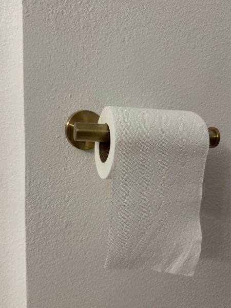 Gold toilet paper holder - bathroom accessories 

#LTKhome