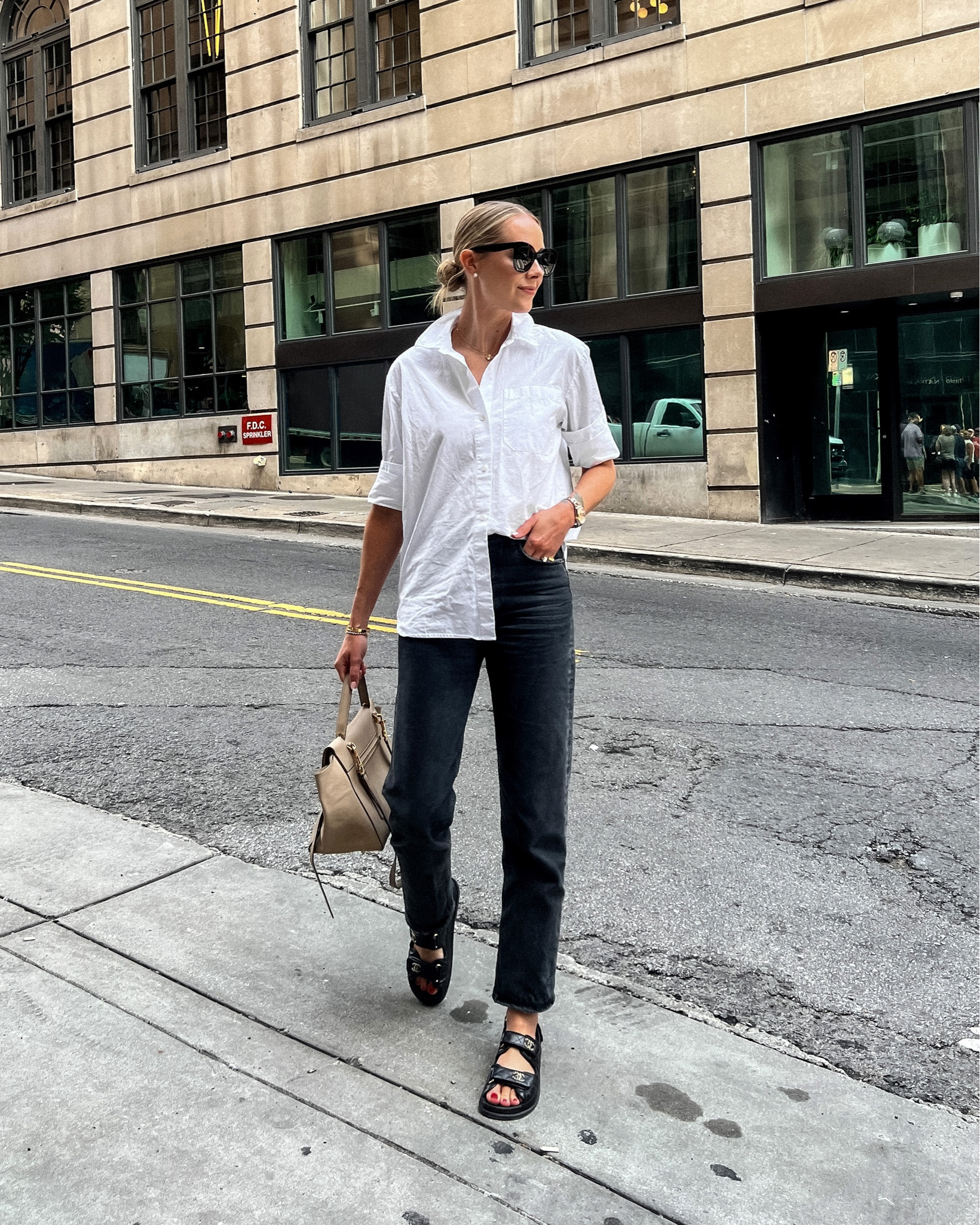 Fashion Jackson wearing Jenni Kayne white button up shirt (code FASHION_JACKSON20), AGOLDE black jeans, Chanel dad sandals, #fashionjackson #falloutfit #weekendstyle 

#LTKshoecrush #LTKstyletip