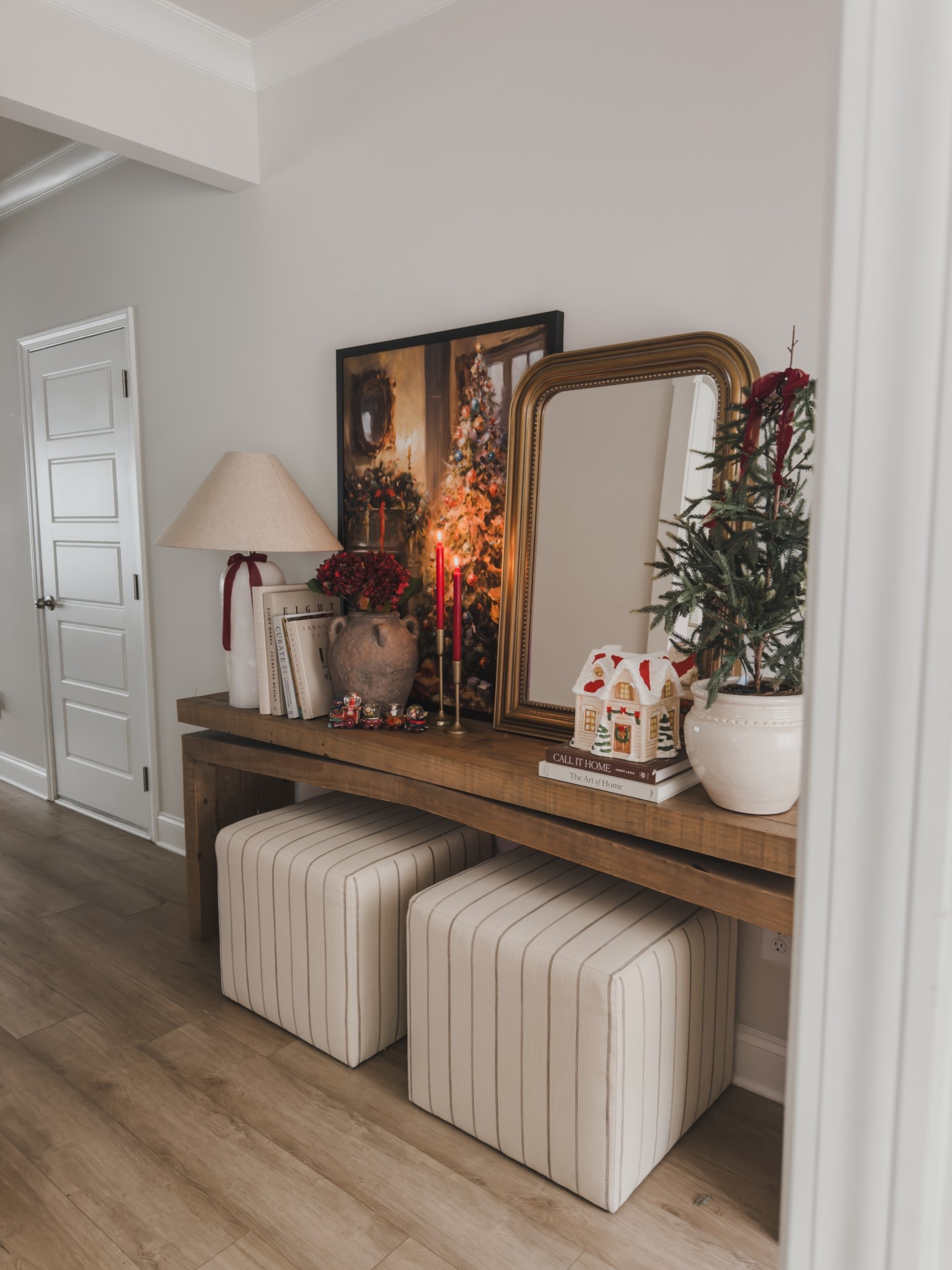Holiday home decor in my front entry way! Styled with wayfair furniture finds, striped upholstery, touches of red and vintage finds! 

The art was printed and framed by Frameology ❤️


Home tour, holiday inspo, Christmas style, Christmas decor, shop the look! 

#LTKSeasonal #LTKHome #LTKHoliday