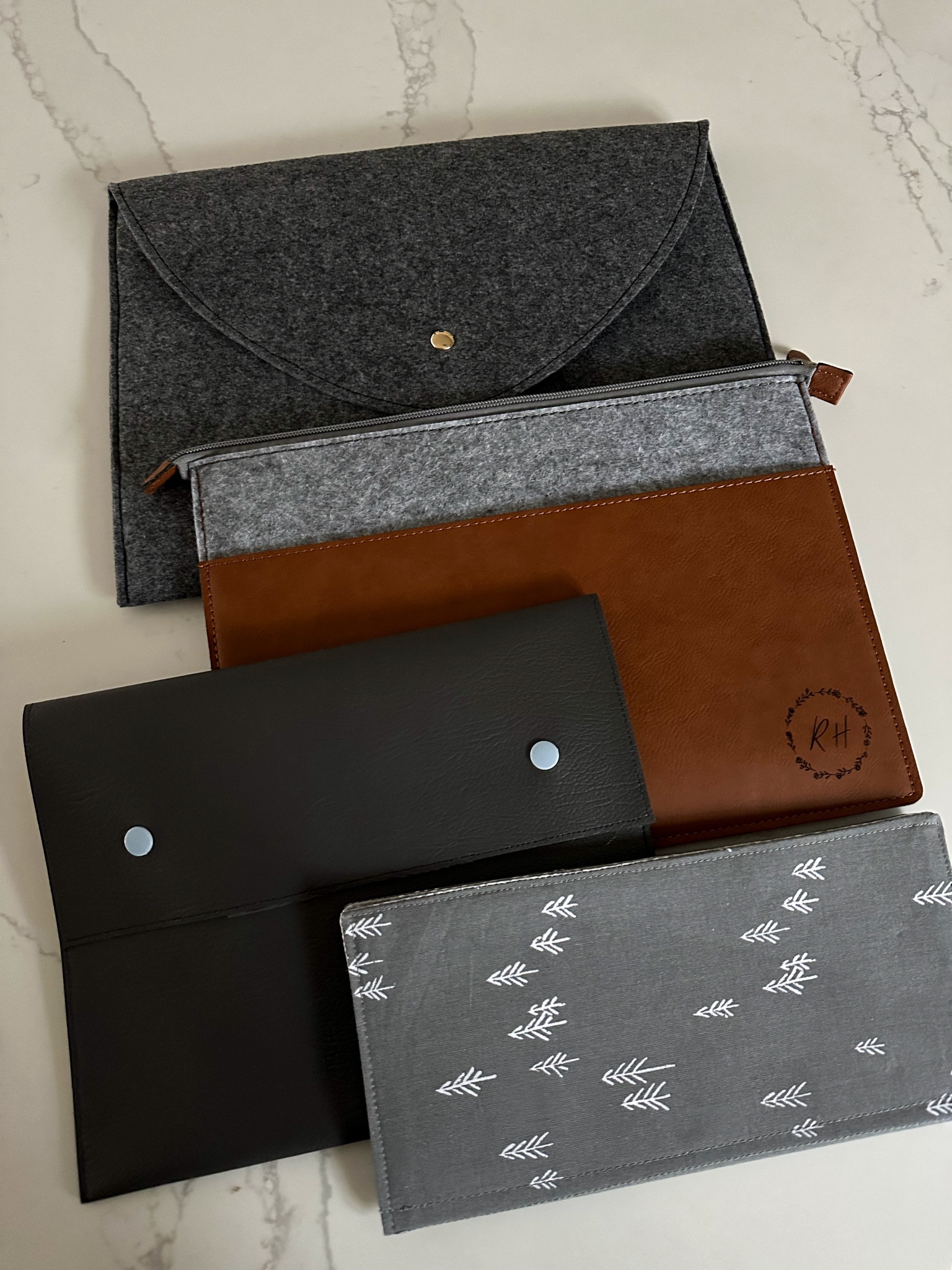 Custom pouches. Use as an iPad sleeve or a perfect little upgrade for service/ministry tools. Love my leather/felt combo with engraved initials 🩶

#LTKfindsunder50 #LTKGiftGuide #LTKitbag