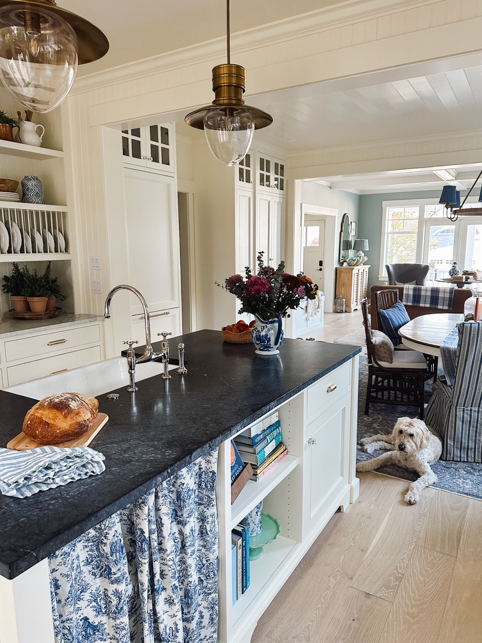 Coastal cottage kitchen - toile blue white cafe curtain, ceiling pendants, farmhouse sink and bridge faucet and more! See the whole tour and more details at theinspiredroom.net

#LTKstyletip #LTKhome #LTKSeasonal