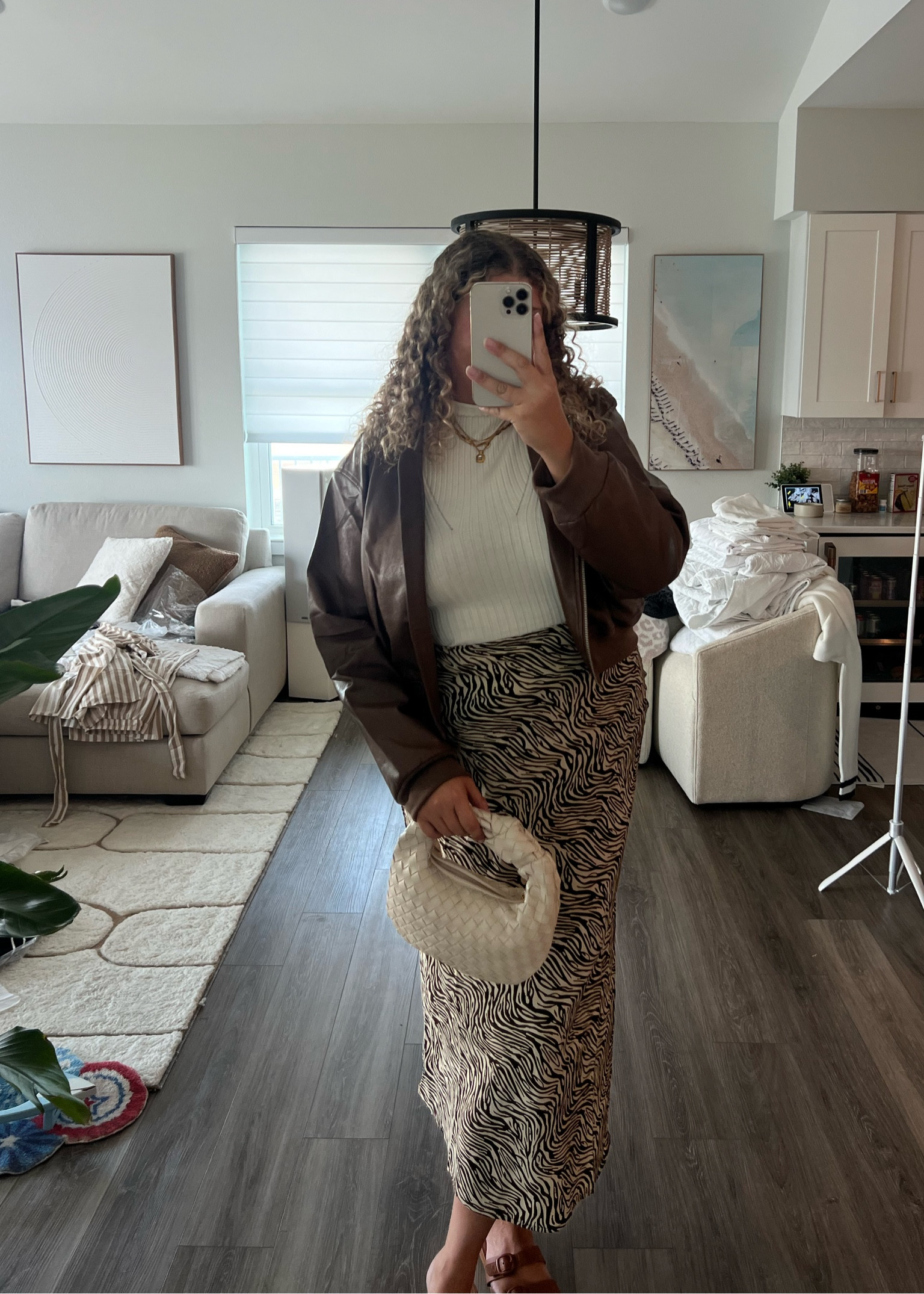 Zebra maxi skirt paired with a mock neck tank and cropped leather jacket for a comfy fall date night look from vici. 

#LTKMidsize #LTKxVICI #LTKBacktoSchool