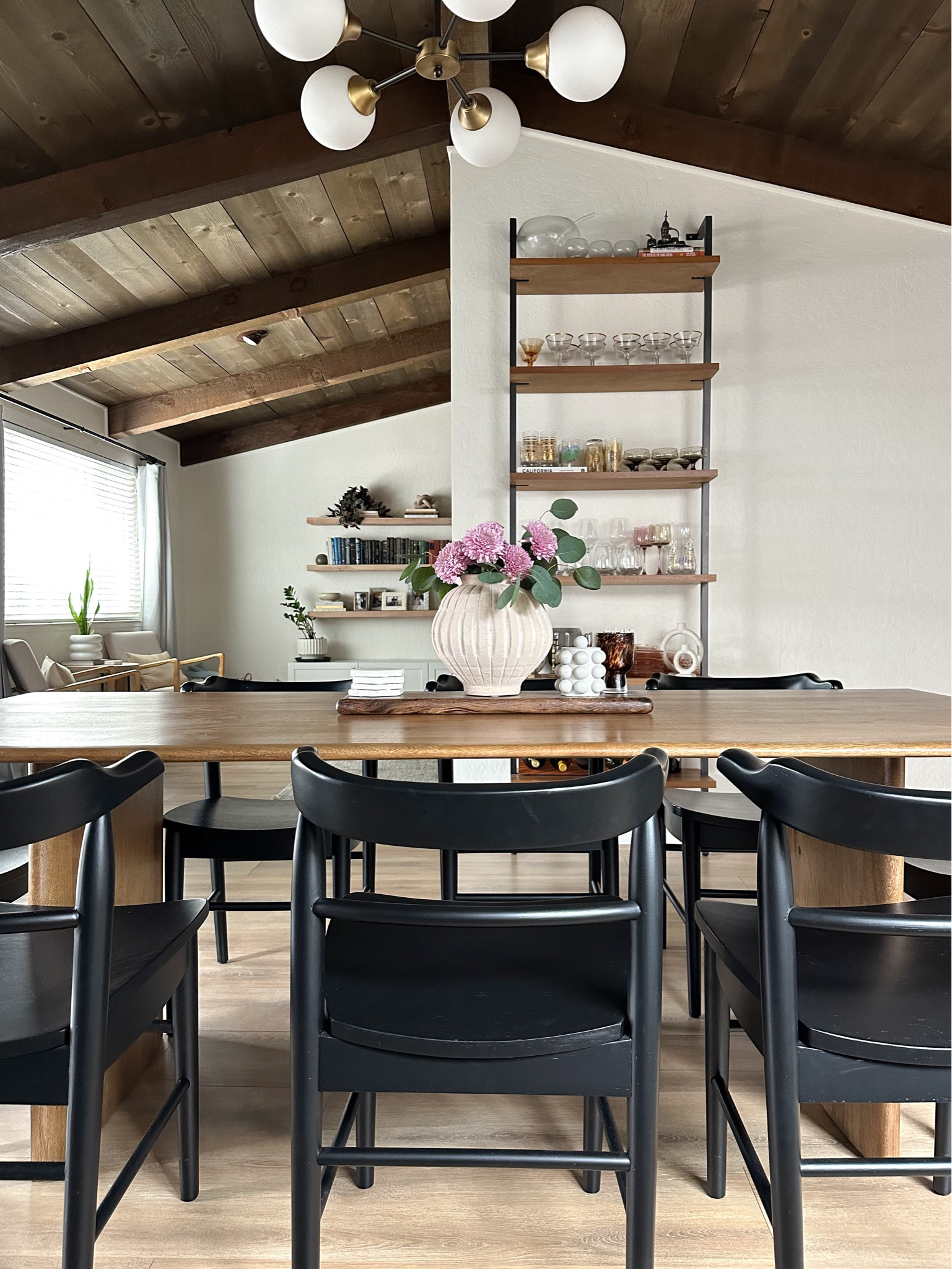 Spring dining room. Black dining room chairs. Wood dining table  

#LTKhome #LTKstyletip #LTKSeasonal