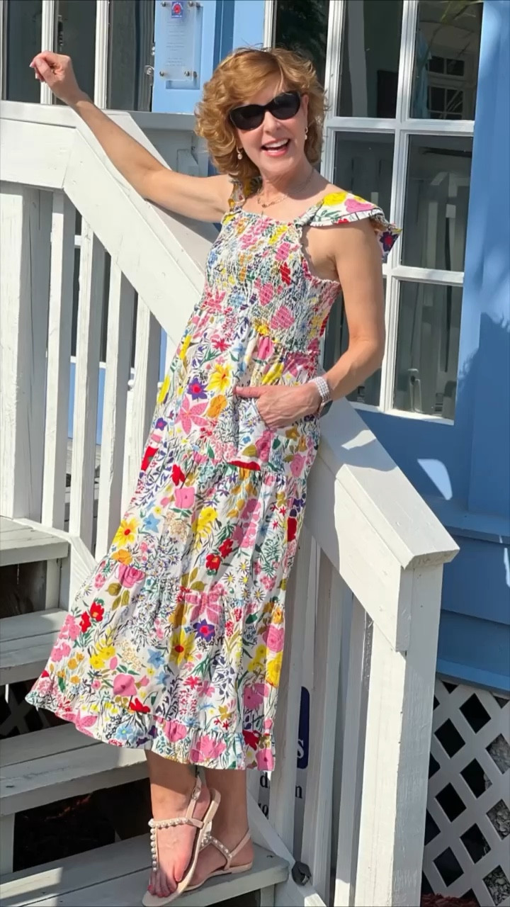 This summer dress has everything you need! It’s a floral dress, with a smocked bodice, a tiered skirt, a wide ruffle hem, and ruffle sleeves. So feminine!

I paired it with a pearl Apple Watch band, pearl and gold earrings, and nude pearl embellished jelly sandals.

#LTKSeasonal #LTKstyletip #LTKshoecrush