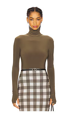 Long Sleeve Turtleneck Bodysuit
                    
                    Norma Kamali | Revolve Clothing (Global)