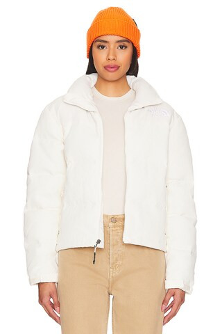 The North Face W 92 Ripstop Nuptse Jacket in White Dune from Revolve.com | Revolve Clothing (Global)