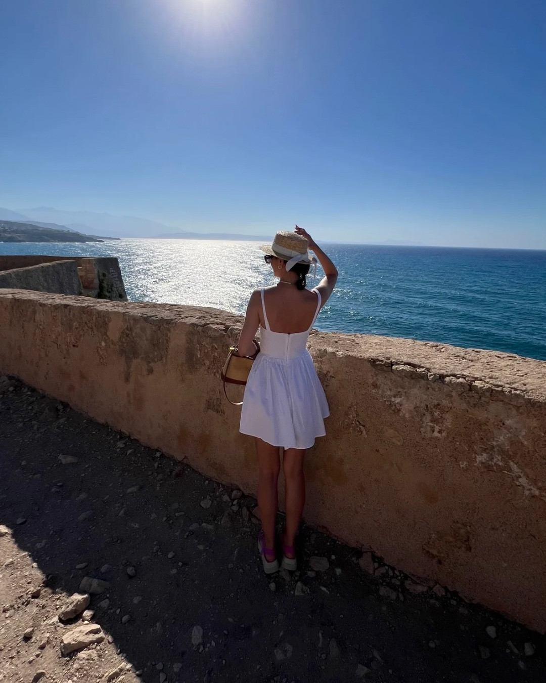 Exploring the beauty of Crete in this cute mini white dress ✨. Perfect look for a day of sunshine and stunning views! 🌊

The raffia hat & bag are a must this summer. 🌅


#LTKtravel #LTKdresses #LTKAroundTheWorld