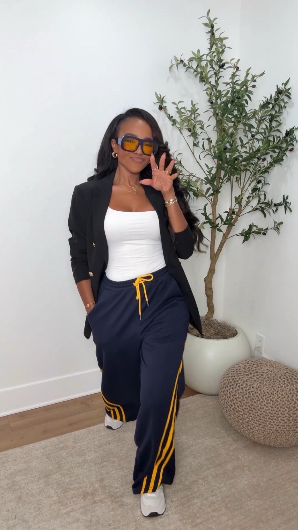 Sporty-chic energy 🖤💛
An elevated athleisure moment — track pants, a fitted tank, and a structured blazer for that cool “off-duty but polished” vibe. Comfortable, confident, and surprisingly chic.

Perfect for casual Fridays, errands, or travel days.

📏 Sizing: Small in top + pants
Height — 5’4” | 138–140 lbs | Bust — 34–36D | Waist — 27” | Hips — 40”
Blazer fits true to size | Sneakers Amazon

sporty chic outfit, elevated athleisure, track pants styling, model-off-duty inspo, casual polished looks, blazer and sneakers outfit idea

✨ Everything linked below for easy shopping

Follow me on Instagram and YouTube @kirasfashionfinds

#LTKootd #LTKdayinmylife #LTKPetite
