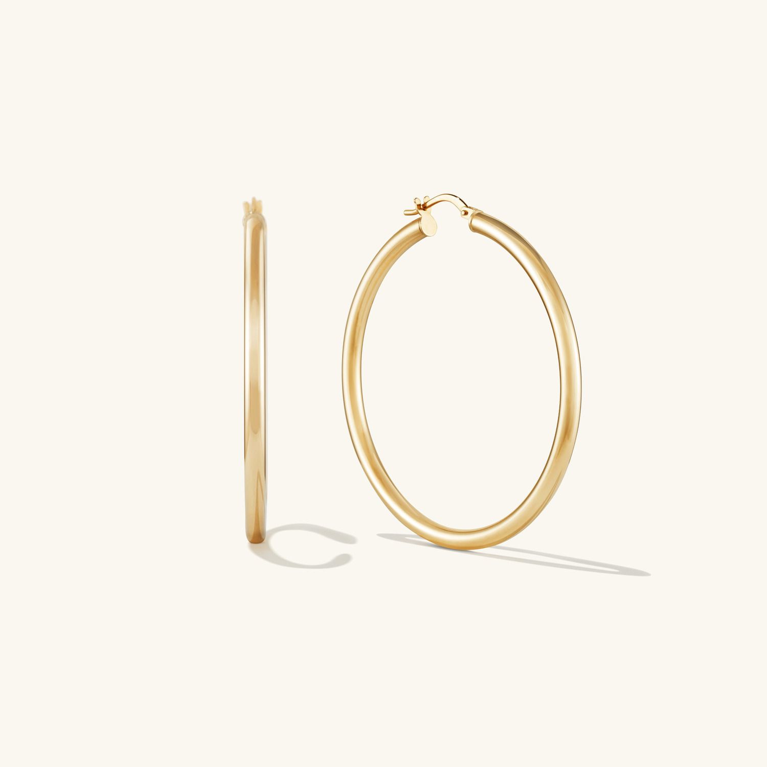 Medium Tube Hoops - $325 | Mejuri (Global)