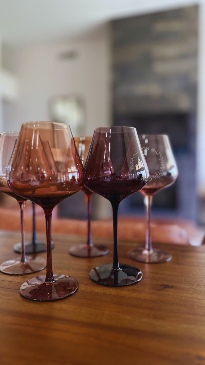 Beautiful tinted wine glasses is a wonderful accent to any table setting or party #aziquestyle #interiordesign #tablesetup #partyessentials

#LTKHome #LTKGiftGuide #LTKParties