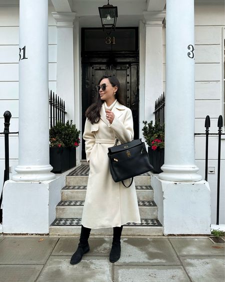 Kat Jamieson wears a cream coat in London. Classic style, fall outfit, boots, Hermes. 

#LTKitbag #LTKSeasonal #LTKHoliday