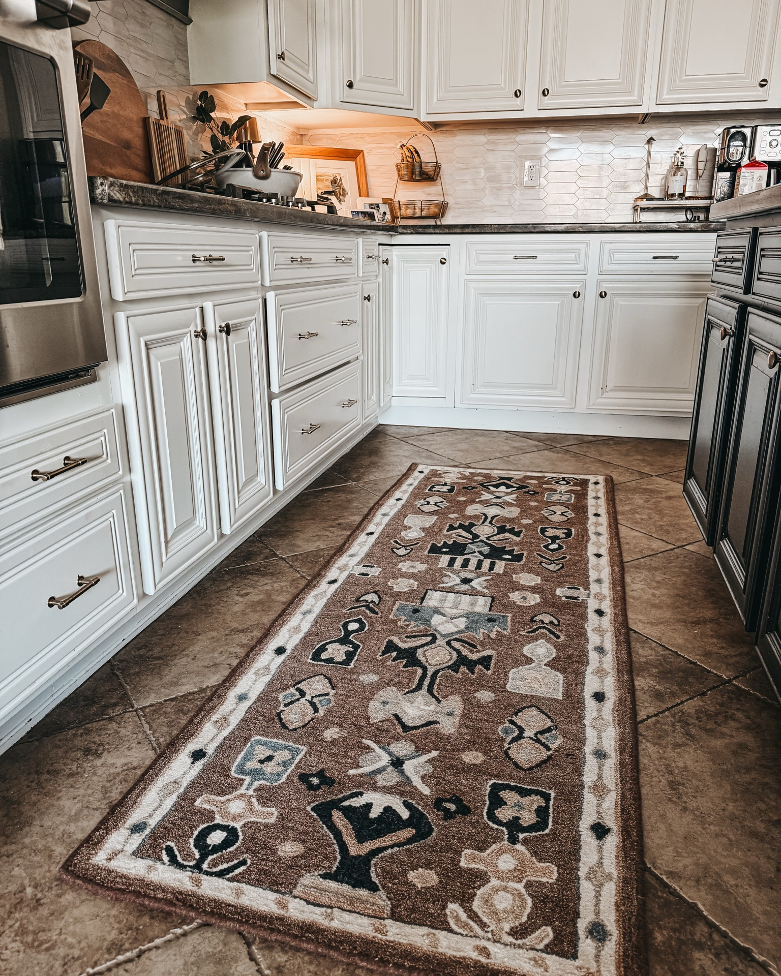 NEW!! 
The rug that changed my whole kitchen. I love this neutral pattern — it picks up all the warm & cool tones throughout my home and is perfect for a laundry room, kitchen, or hallway. Linked below! 🤎🤍🩶🖤#LTKfindsunder100 #LTKstyletip #rughunting #kitchendecor #neutralhome #Target #TargetHome #RunnerRug

#LTKHome #LTKSaleAlert