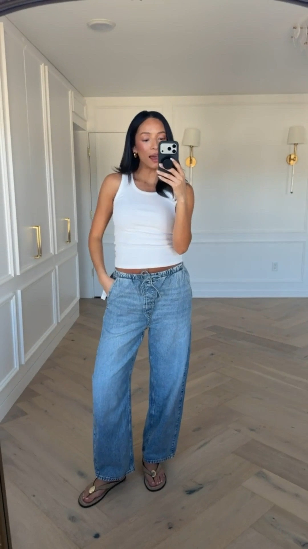 Postpartum gap favorites on SALE!! These barrel jeans are so cute, casual and super comfortable with an elastic waistband! Wearing size S white tank and size M barrel jeans 

spring fashion, spring style, spring outfit, casual outfit, weekend outfit, mom outfit, postpartum outfit, jeans, gap outfit, gap sale