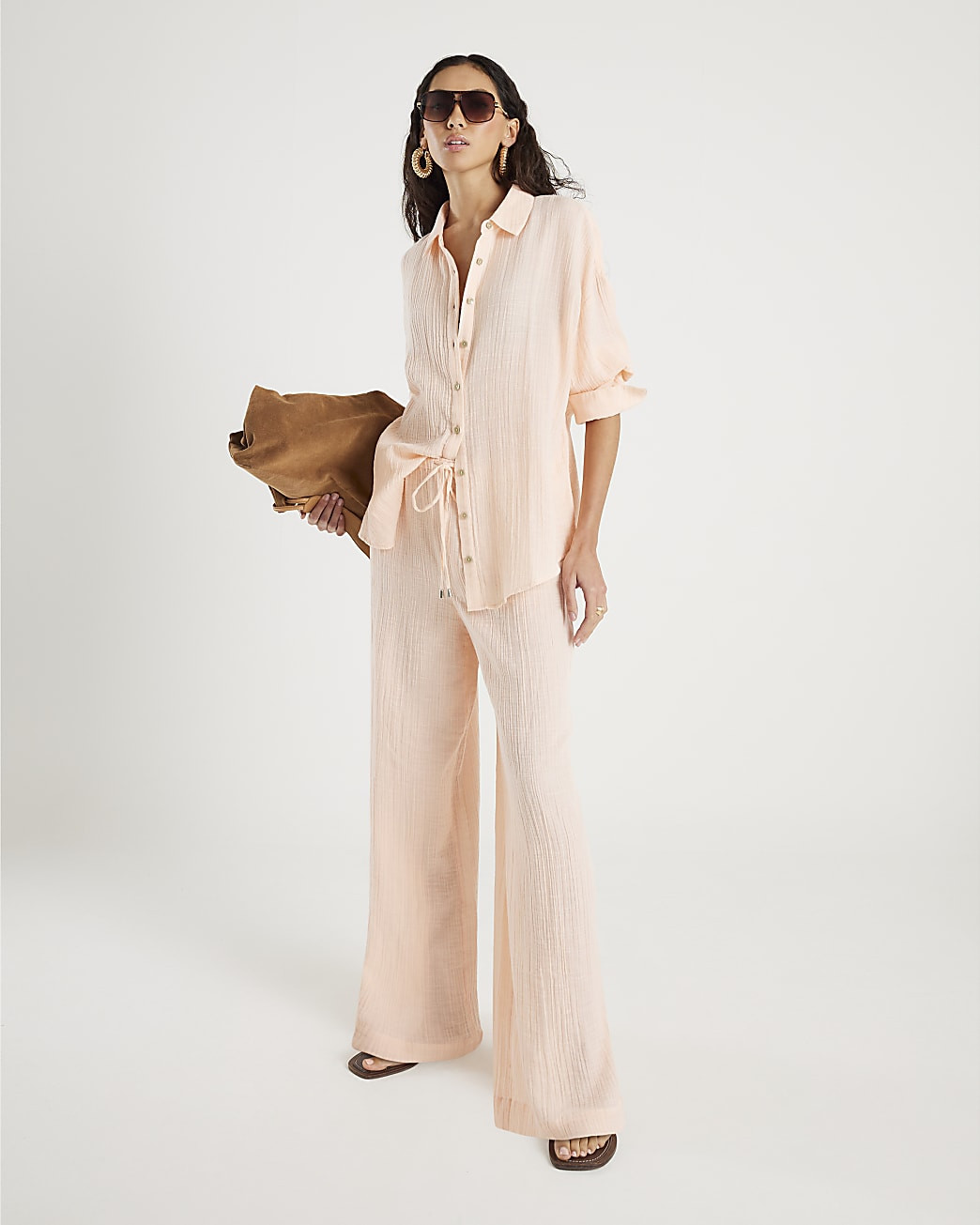 Pink Crinkle Wide Leg Trousers | River Island UK & IE