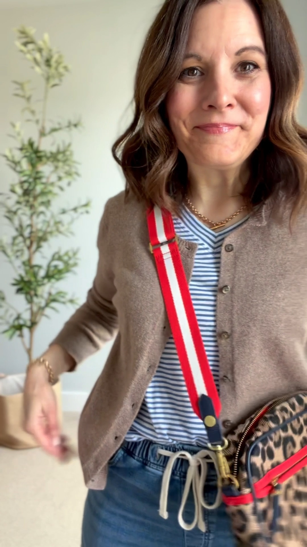 Today’s easy Saturday outfit for errands and watching soccer. I love bottoms that I can wear with my hands shoved in my pockets. And I love the contrast of this light blue striped tee with a taupe cardigan and this fun bag (similar linked). Jeans: TTS, Tee: TTS, Cardigan: size up

#LTKOver40 #LTKMidsize #LTKSaleAlert