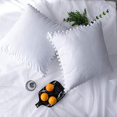 NATUS WEAVER White Velvet Decorative Throw Pillow Covers Pom Poms Soft Solid Square Cushion Cases... | Amazon (US)