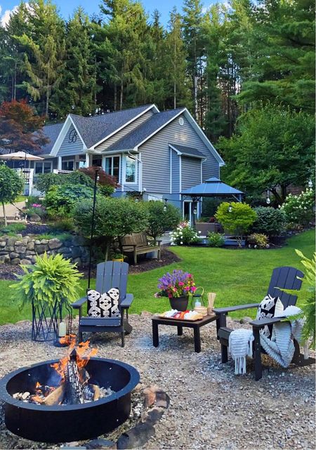 Firepit Area. Follow @farmtotablecreations on Instagram for more inspiration. Adirondack Chairs. Firepit Ring. Faux Ferns. Patio Chairs. Outdoor Chairs. Fire Pit Chairs  

#LTKSeasonal #LTKunder100 #LTKFind