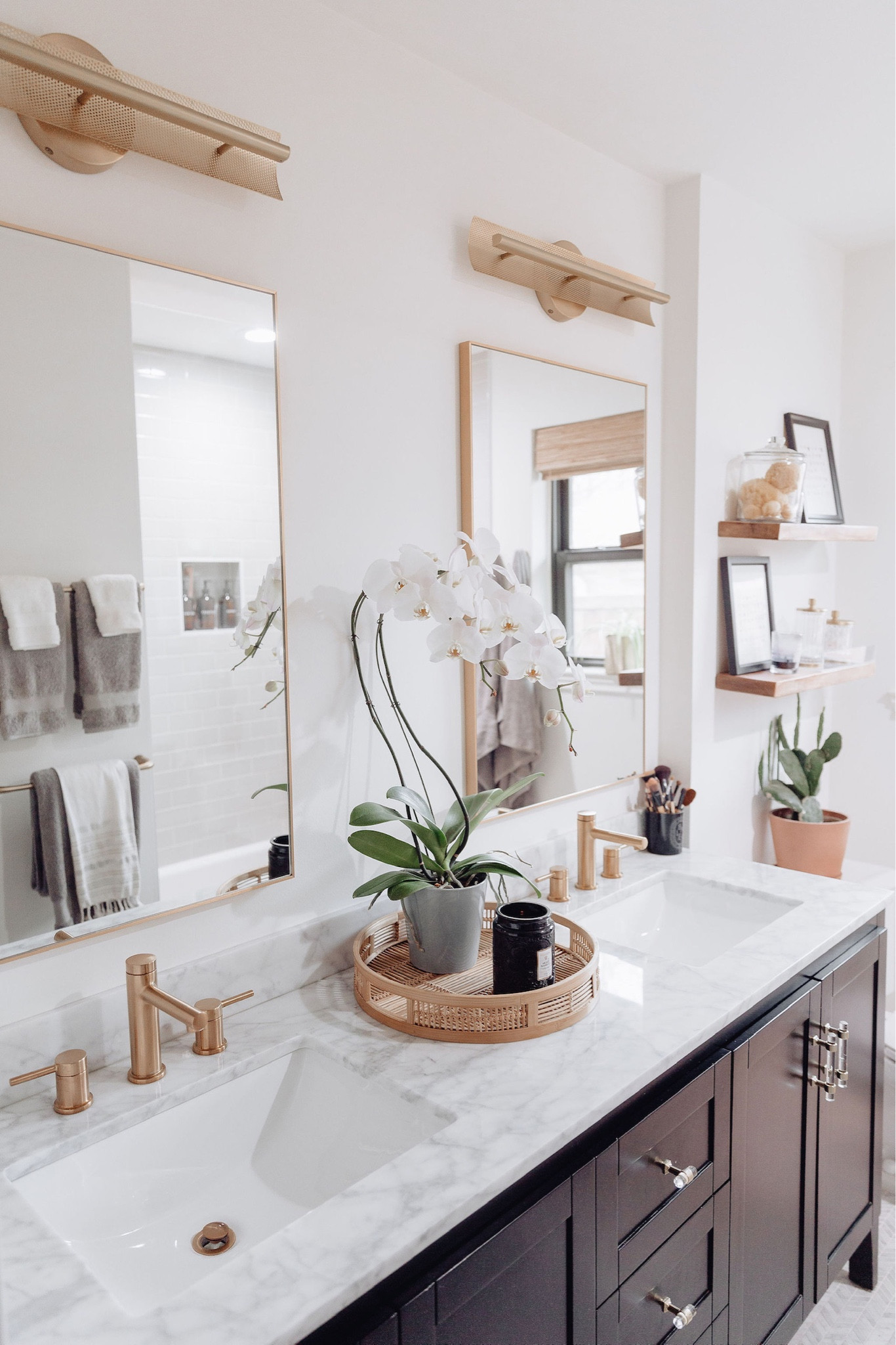 Bathroom // bathroom decor, bath, powder room, home decor, modern home decor, mirror, floating shelves, shelving, vanity, wall art, modern art, decorating, towels, rugs, neutrals, neutral home, decor, modern, minimalist, minimalist style, wall hanging decor, boho decor, neutrals, interior, interior design

#LTKhome