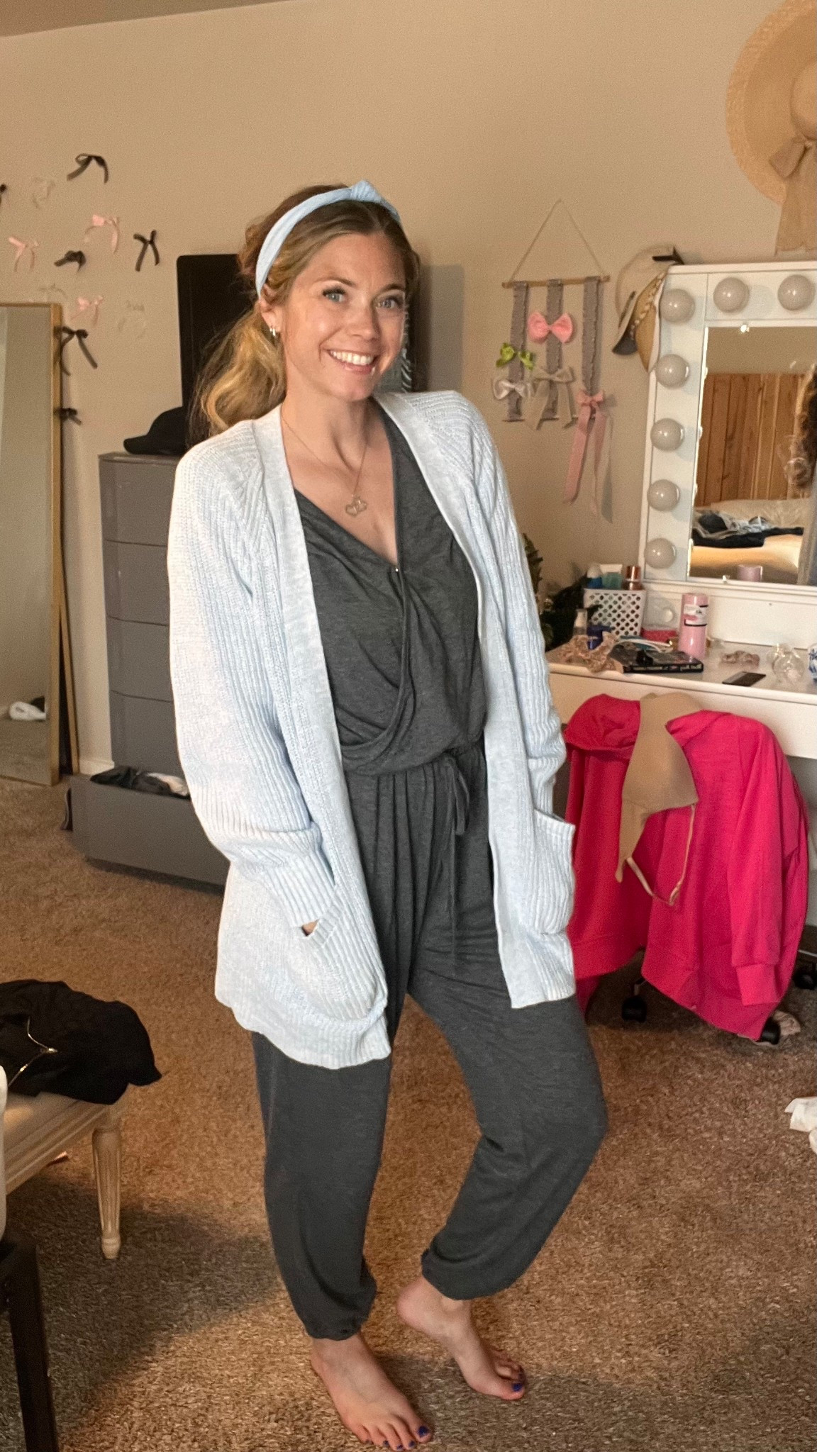 This outfit is a mom outfit essential! I love a jumpsuit and this one has a button for make it breastfeeding friendly and just throwing a cardigan over it makes it extra cozy when just hanging out at home most of the time. I thrifted this look but I think I found the exact jumpsuit on Amazon and similar cute cardigan options  

#LTKStyleTip #LTKFindsUnder50 #LTKFamily