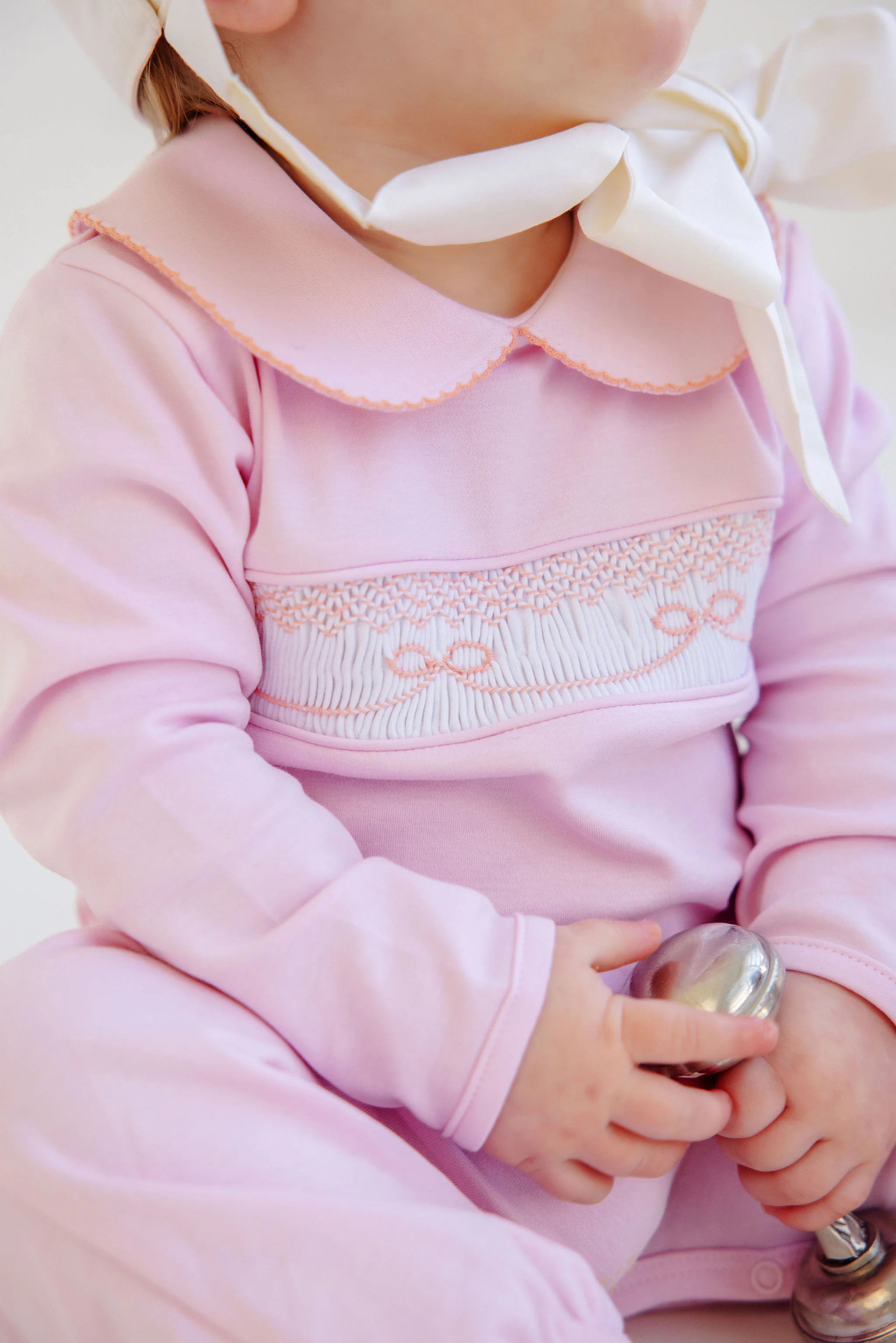 Rigsby Romper - Palm Beach Pink with Seashore Sherbet Bow Smocking | The Beaufort Bonnet Company