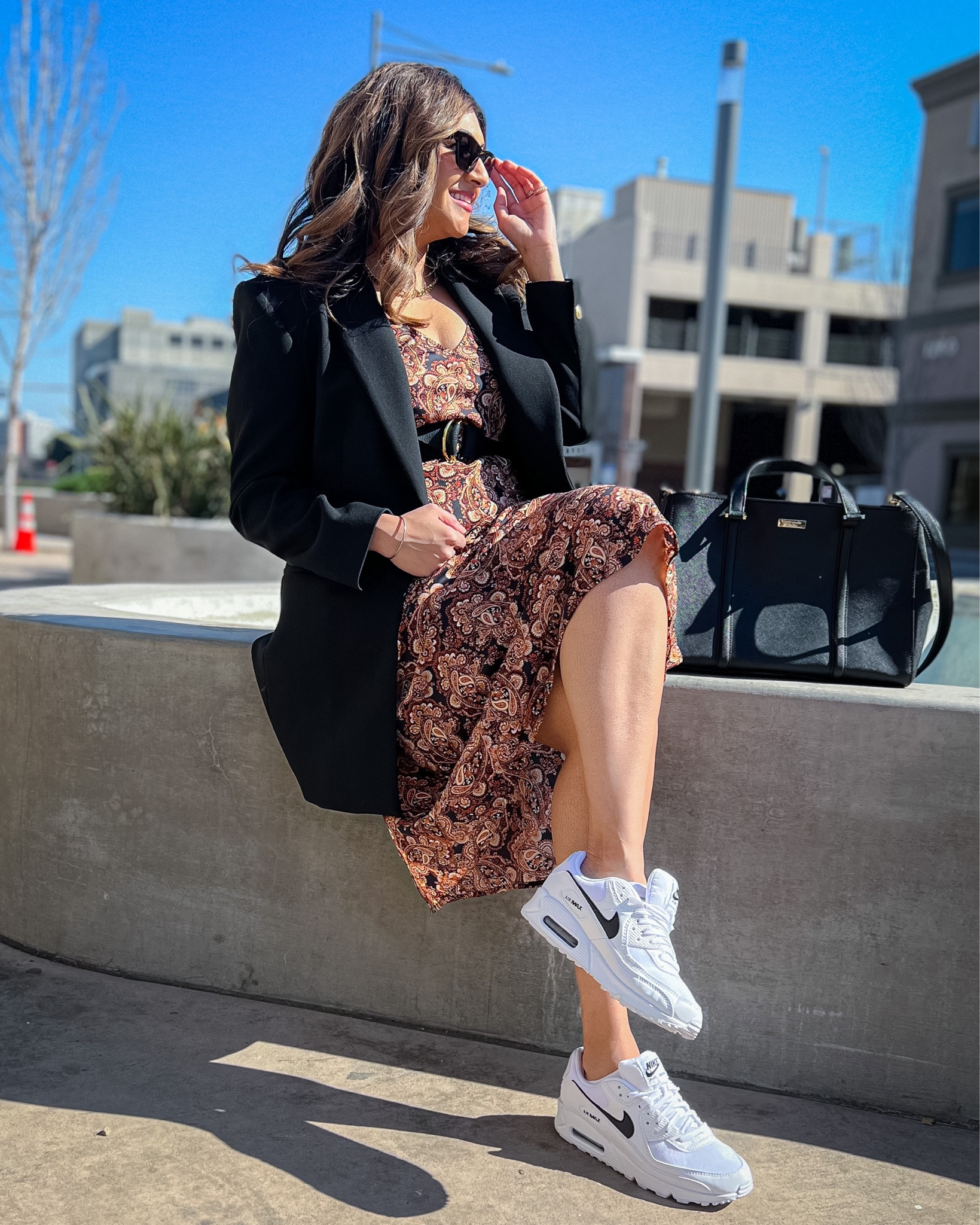 Sharing an easy look for fall workwear.
I’ve paired this paisley slip dress with a black belt, oversized black blazer. I’ve swapped out my dress shoes for these Nike air sneakers as I commute. I take my Michael Kors
Tote bag to work. 

Teacher outfit 
Workwear
Business casual 
Fall business casual
Midsize workwear
Size 10

#LTKworkwear #LTKshoecrush #LTKmidsize