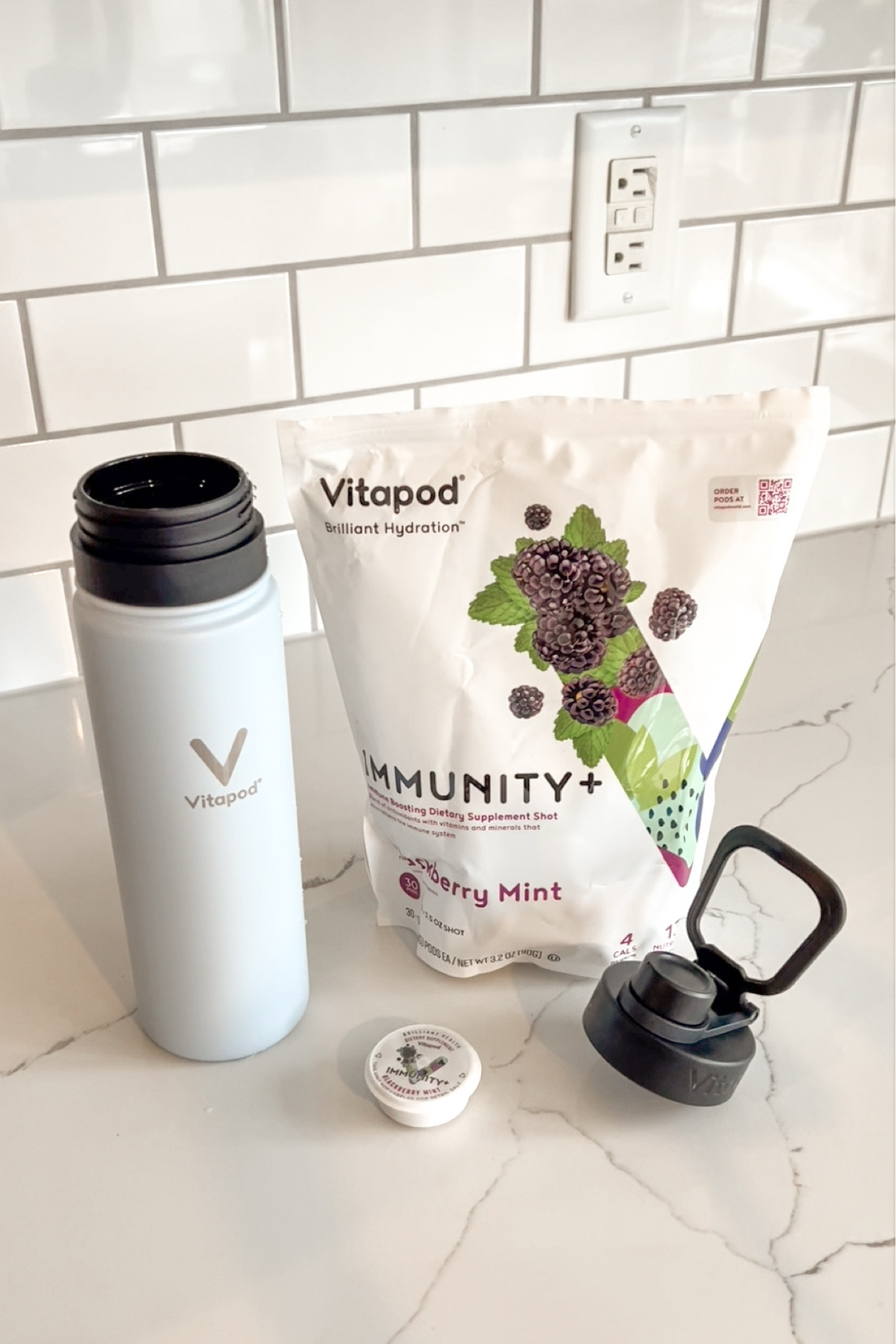 As a busy mom to a 3 year old, I am trying everything I can to NOT get sick. Kids bring home tons of germs, so I love that Vitapod has Immunity+ pods that are filled with vitamins and nutrients to help strengthen my immune system! Some ingredients include: Bilberry Extract, Isoquercetin, Green Tea, Vitamins A, C, D, E, and plant based antioxidants. 

The pods are 100% recyclable + super easy to use with the Vitapod water bottle: 
1. Fill with water and ice
2. Place pod face down
3. Put cap on and push down and twist
4. Shake! That’s it :) 

It tastes amazing too! Get your own by checking out my LTK! #ad #vitapod #liketkit 

#LTKBeauty #LTKFitness #LTKFamily