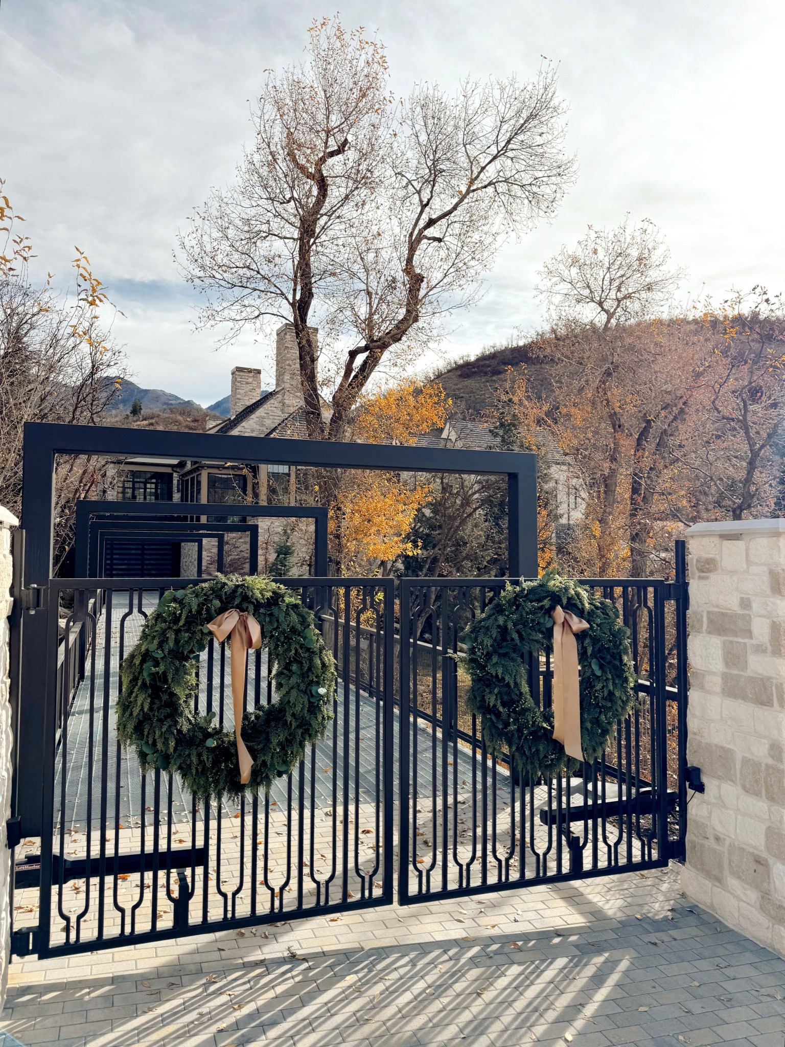 Made these 25 pound wreaths with a base 48” wired wreath then added in 4 thick cedar garlands, juniper picks and eucalyptus picks. And I secured them with heavy duty 400 pounds zip ties on each side. Then spray it with a UV resistant spray.

#LTKHoliday #LTKSeasonal