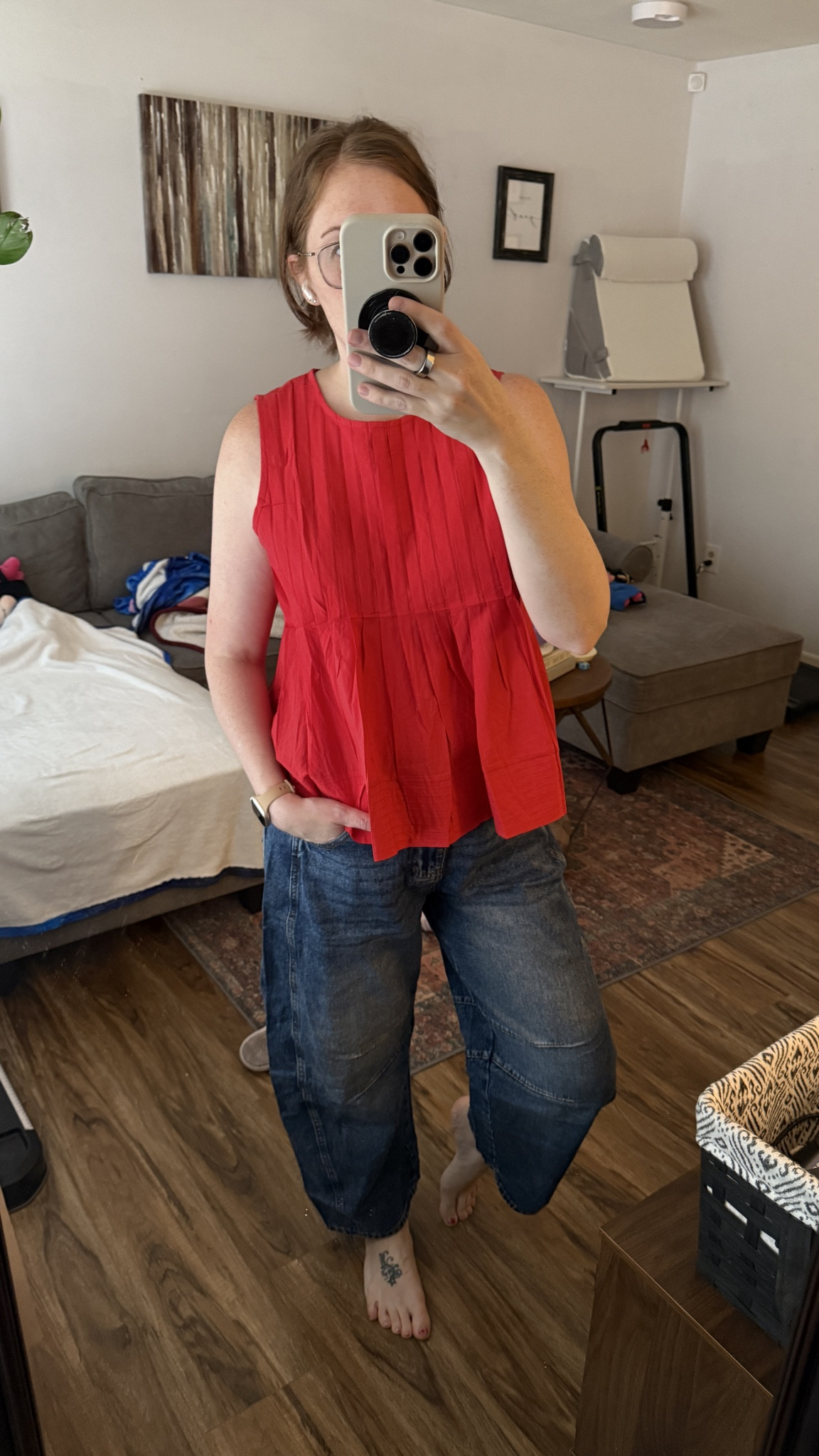 Really loving this red babydoll tank—it’s officially become one of my go-to tops ❤️ Paired it with these barrel jeans (still figuring them out 😅) — thinking they might need a hem? Anyone else tried barrel pants and had to adjust the length? Tank is M, jeans are 8, and I’m 5’7 for reference.

#LTKMidsize #LTKHoliday #LTKSeasonal
