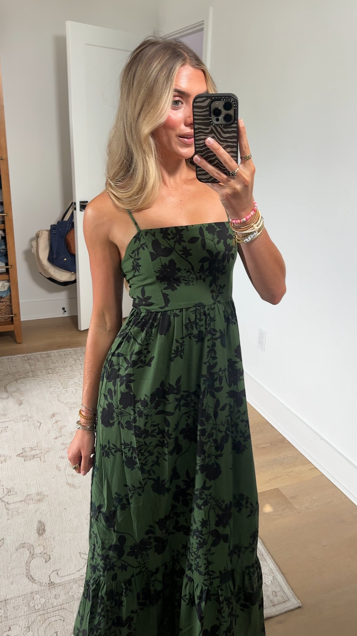 Baltic born code SLOANE15. Wearing size xs. The Rowan Tank Maxi Dress in Deep Olive combines an effortless silhouette with romantic floral detailing for versatile day-to-night styling. Crafted from lightweight chiffon, this maxi dress features adjustable straps, a smocked back, and a flowing tiered skirt that moves beautifully with every step.

#LTKootd #LTKSaleAlert #LTKWedding