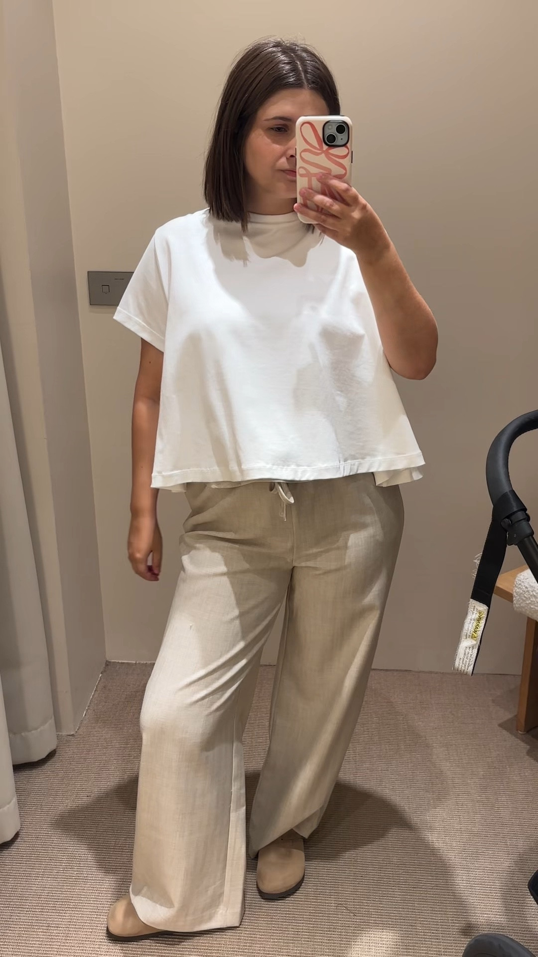 Postpartum change room try on at Dissh
Breastfeeding and bra friendly options. 

I was a 12 in the pants and a M in the tops 