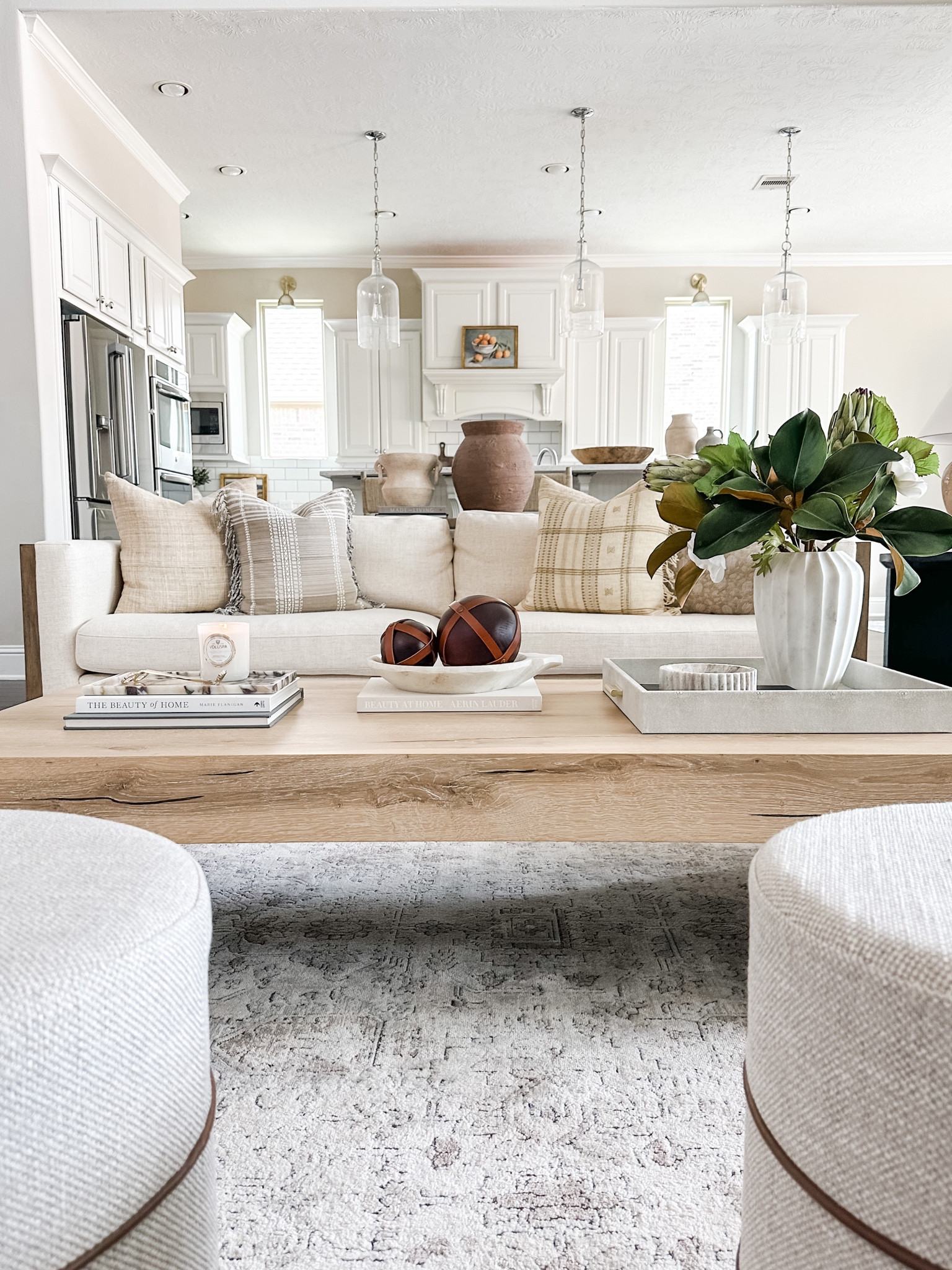 A close up of my living room. My coffee table is a best seller and my rug is too!! My pillows are a mix of high and love. And I linked everything on my coffee table. 

#LTKstyletip #LTKhome #LTKFind