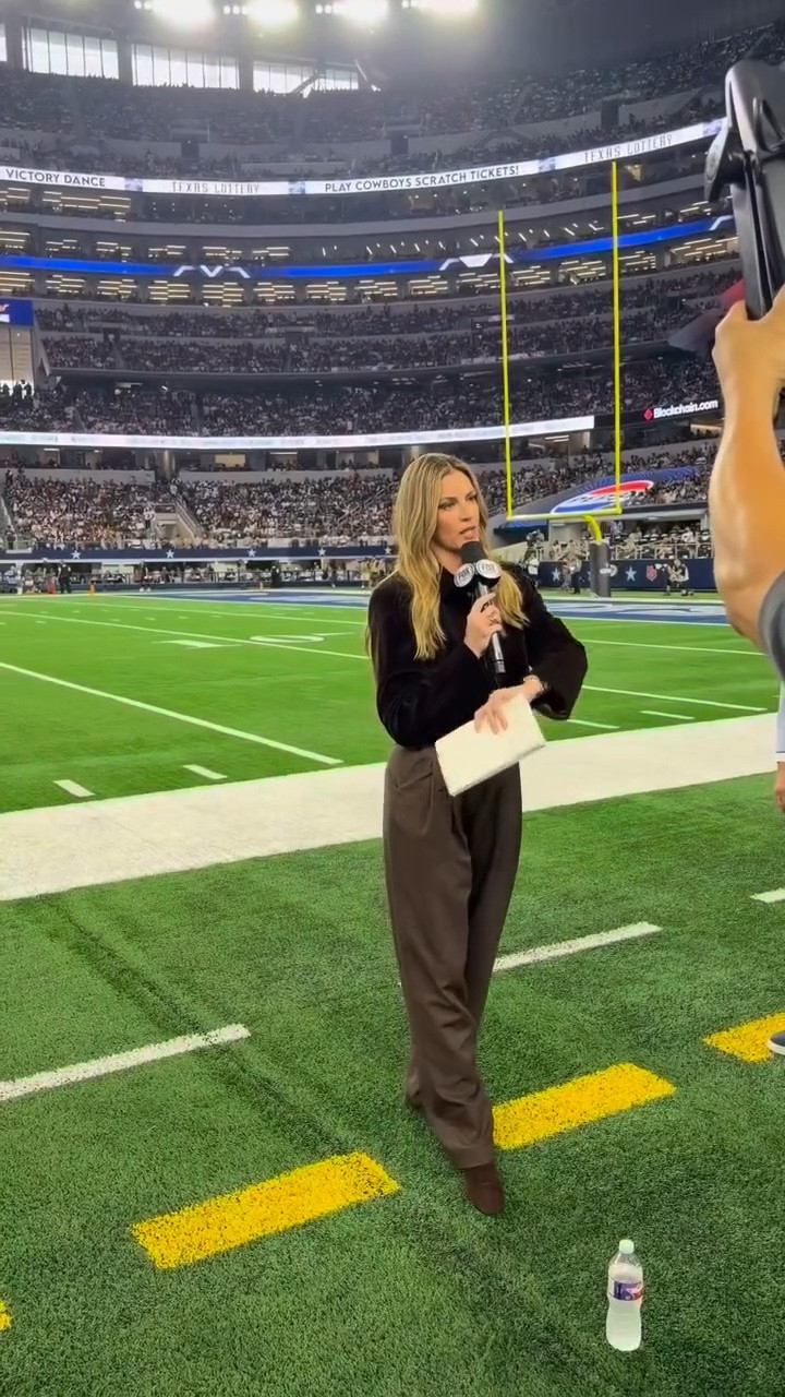 NFL commentator and Podcast star Erin Andrews sideline outfit pleaded trouser pants perfectly fit fitting neutral bodysuit satin zip front chocolate bomber jackets