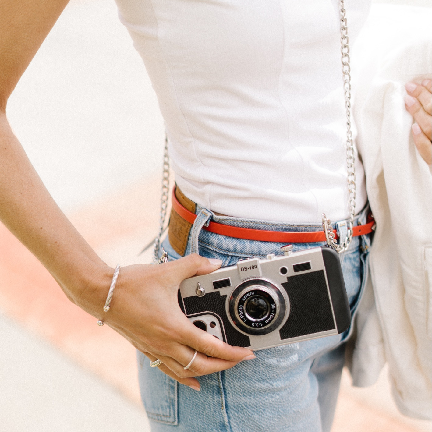 Channel your Emily in Paris with this adorable phone case and matching cross body chain strap. Be fashionable and camera ready at all of your holiday festivities. 