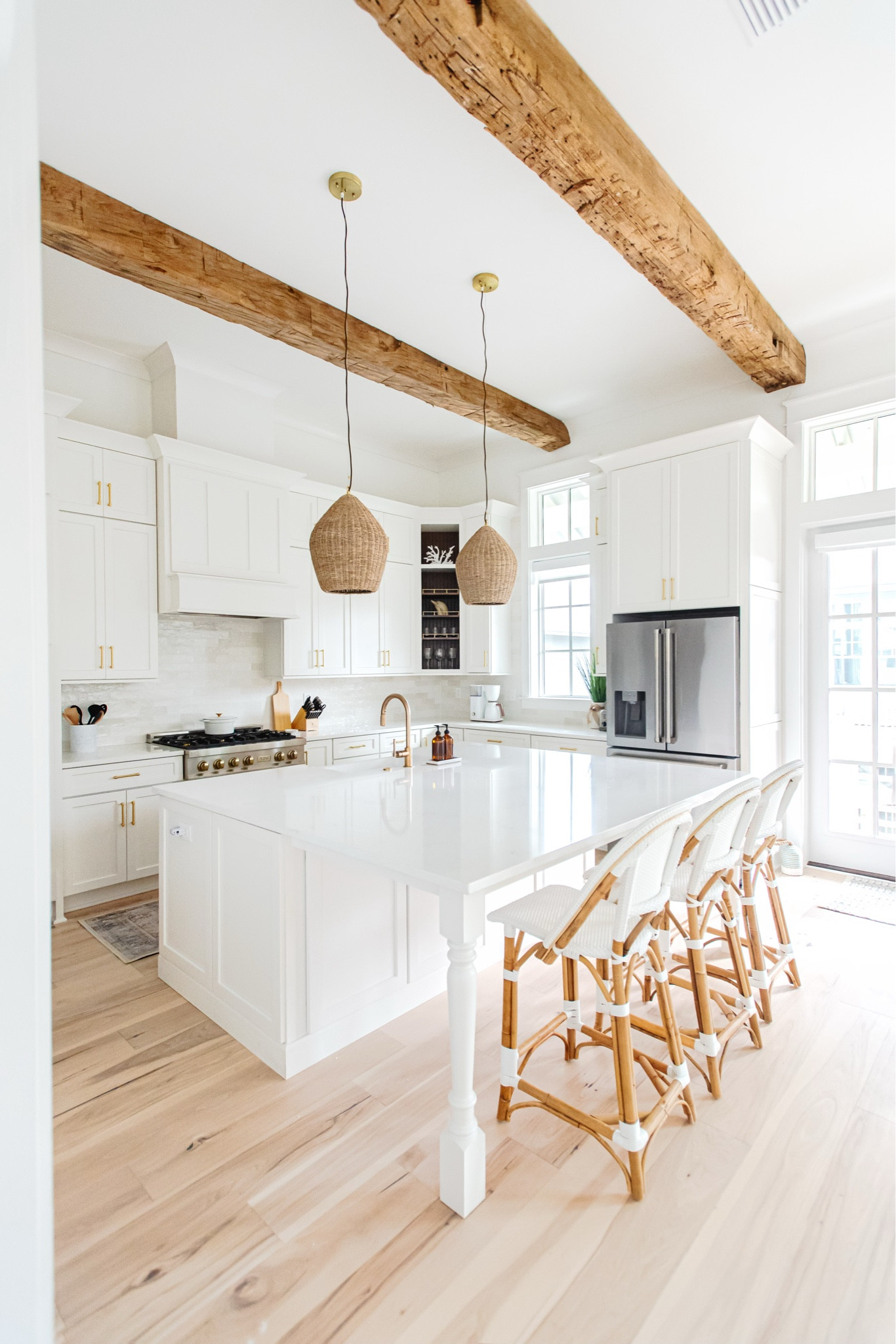 Modern coastal kitchen 🏖️ We LOVE these barstools as they are super sturdy and so easy to wash! Since this house is a rental we needed to make sure we had chairs that could handle lots of families and they have not disappointed! 

#LTKFind #LTKstyletip #LTKhome