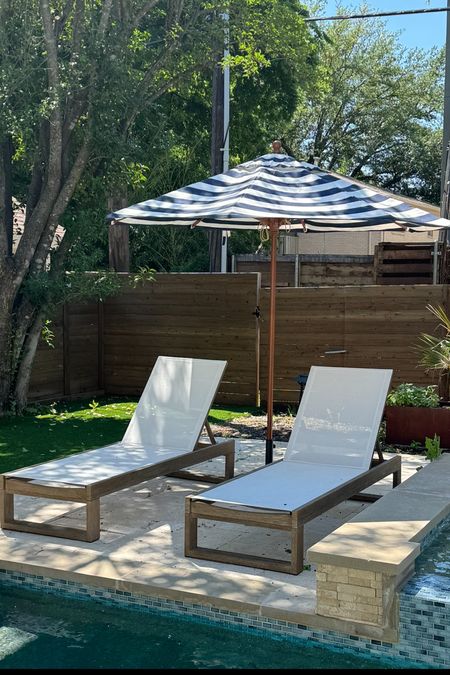 Our new outdoor pool furniture! 

Lounge chairs, outdoor patio, pool, umbrella, outdoor umbrella, stripe umbrella, pool chairs, pool lounge chair, backyard, 

#LTKFamily #LTKHome