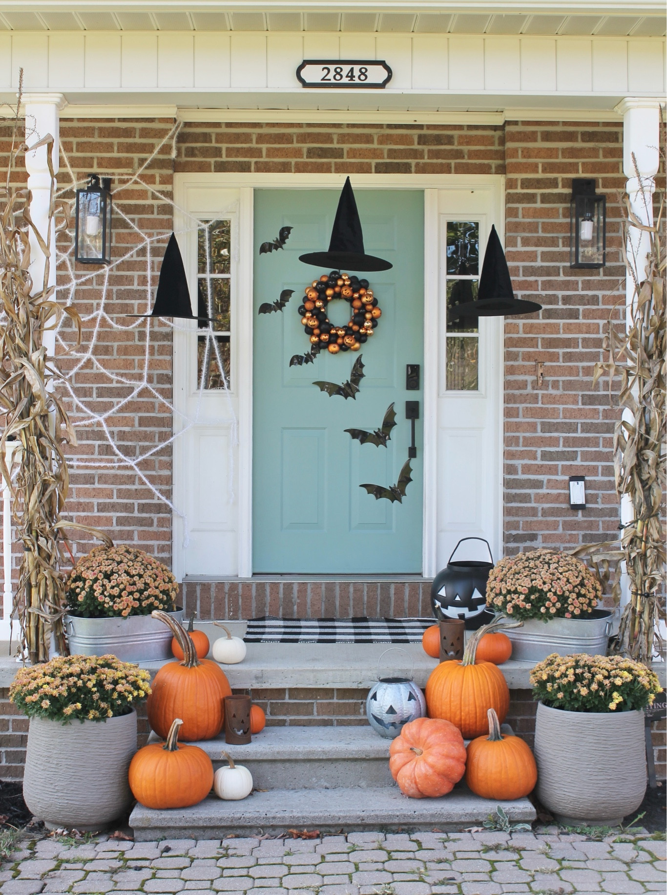Halloween front porch! Halloween decor. Halloween home. Halloween porch. Witch hats. 

#LTKSeasonal #LTKHome #LTKHalloween