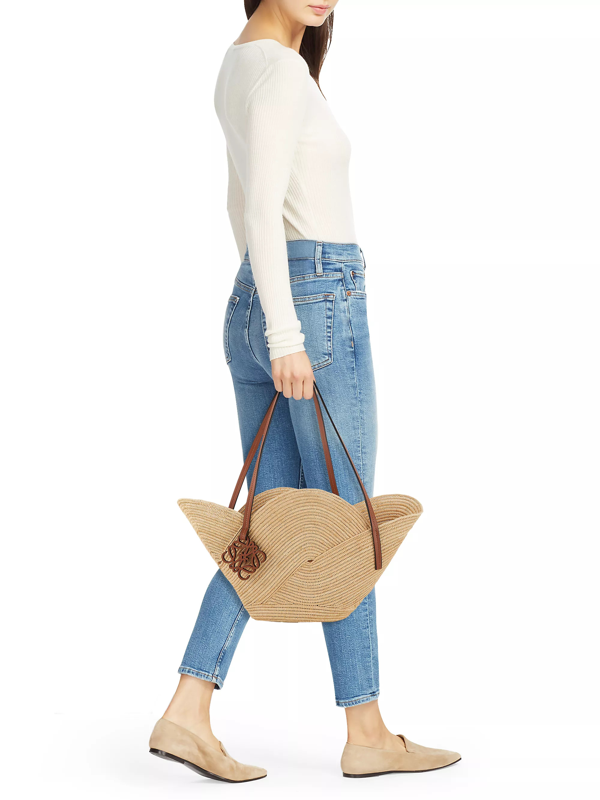 Shop By CategoryTotesLOEWELOEWE x Paula's Ibiza Petal Raffia Basket Bag$1,500 | Saks Fifth Avenue