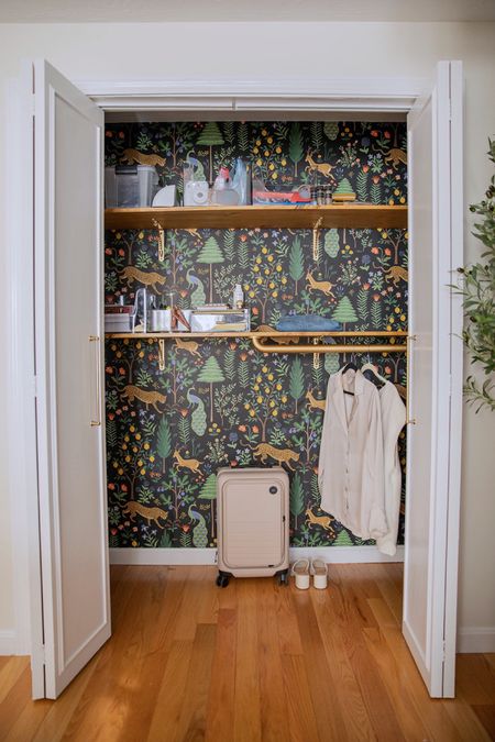 My wallpapered guest room closet. Dark floral wallpaper, eclectic wallpaper suitcase 

#LTKstyletip #LTKhome