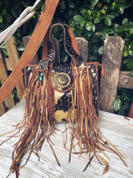 Black gold shoulder bag | Boho Chic Style

#LTKSeasonal #LTKitbag #LTKFind
