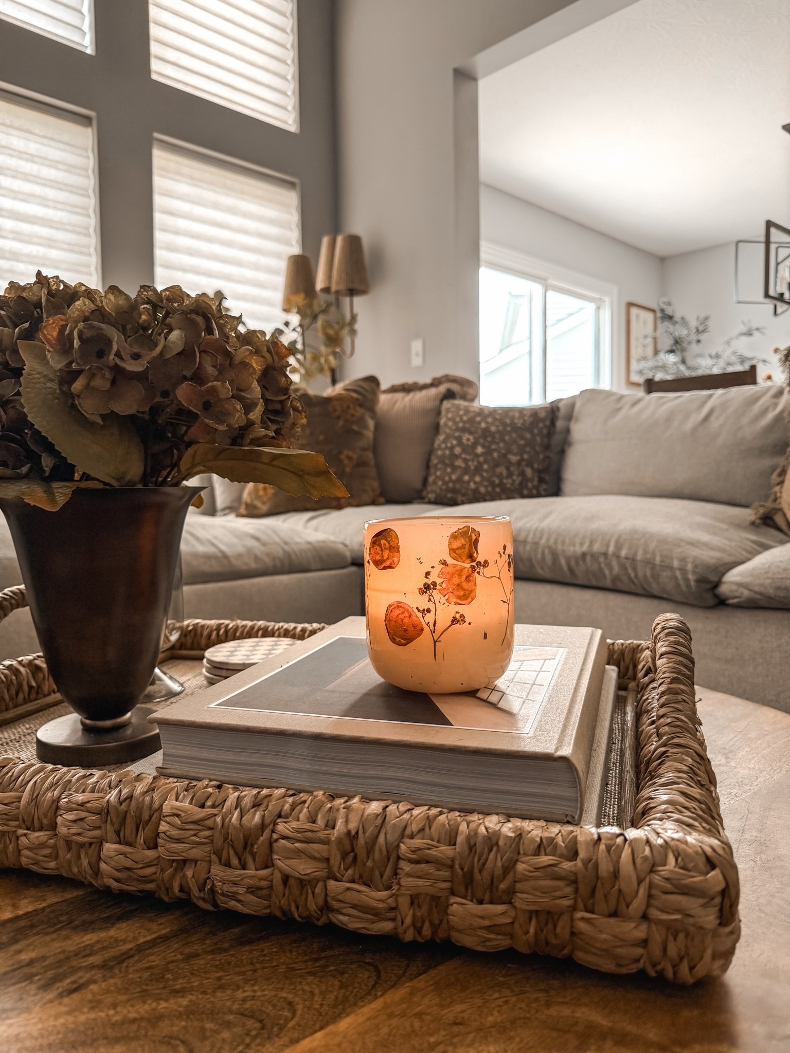 Coffee table styling, living room, vase styling, late summer decor, tray styling, sofa sectional, throw pillows, coffee table books, faux florals

#LTKHome