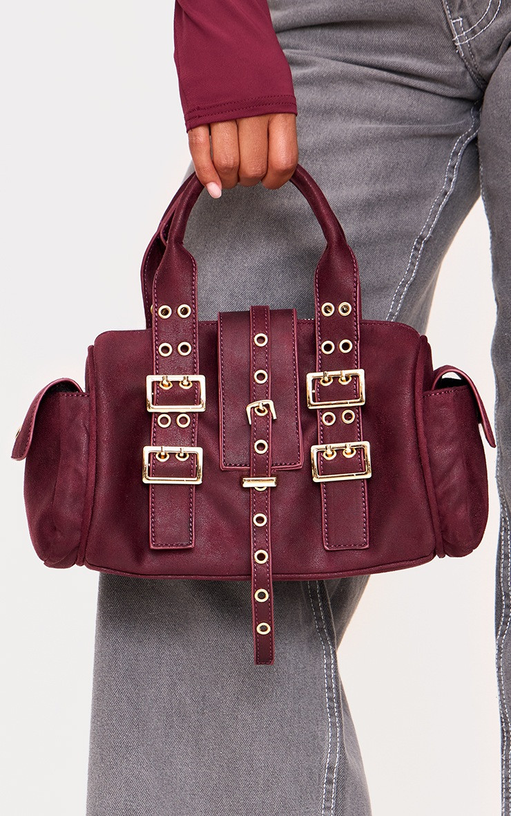 Burgundy Distressed PU Buckle Bowling Bag | PrettyLittleThing UK