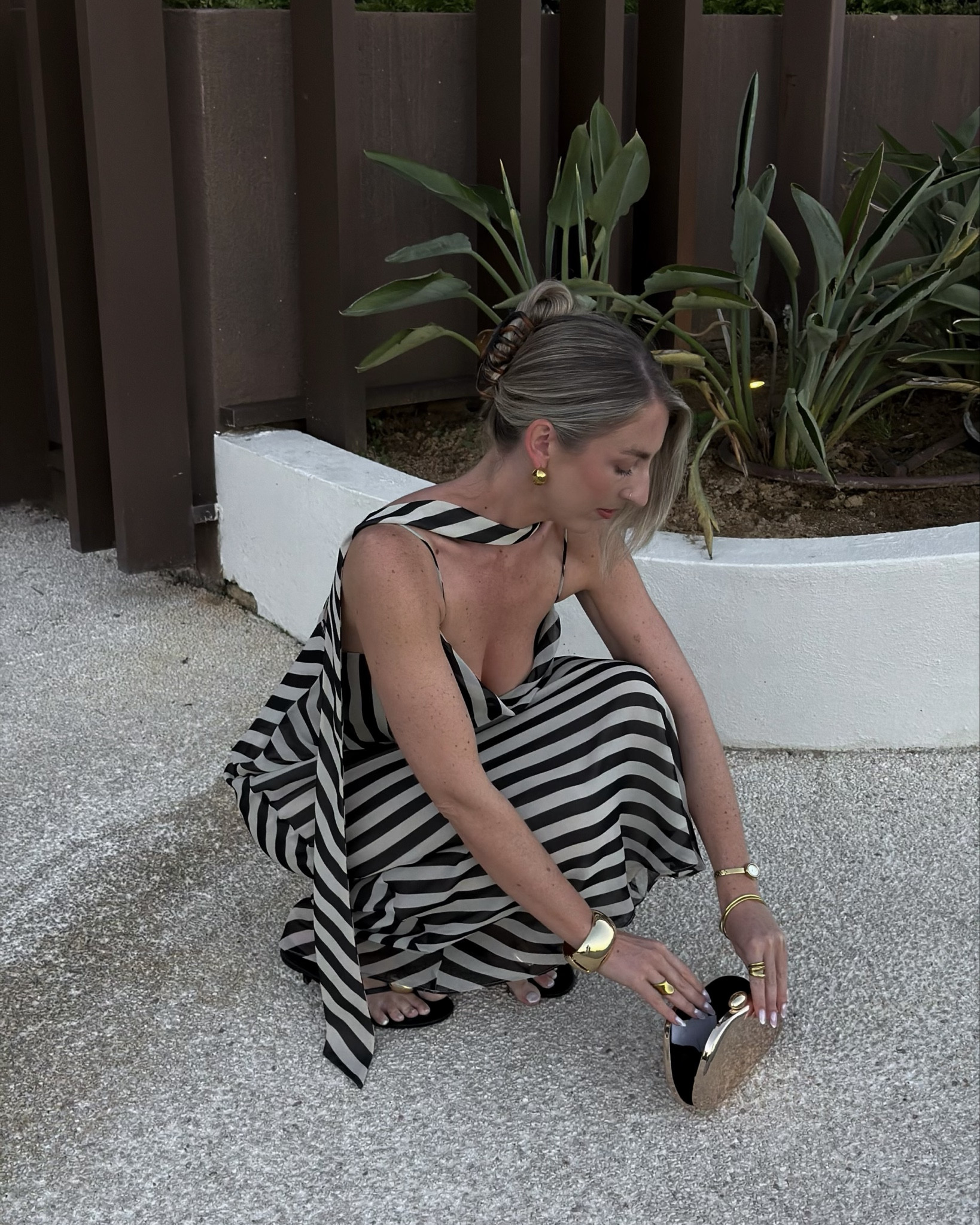 Holiday dinner outfit 🖤 stripe dress is from Mango 

Holiday outfits, evening outfits, stripe dress, scarf dress, gold clutch bag, chic outfits 

#LTKsummer #LTKdatenight #LTKdresses